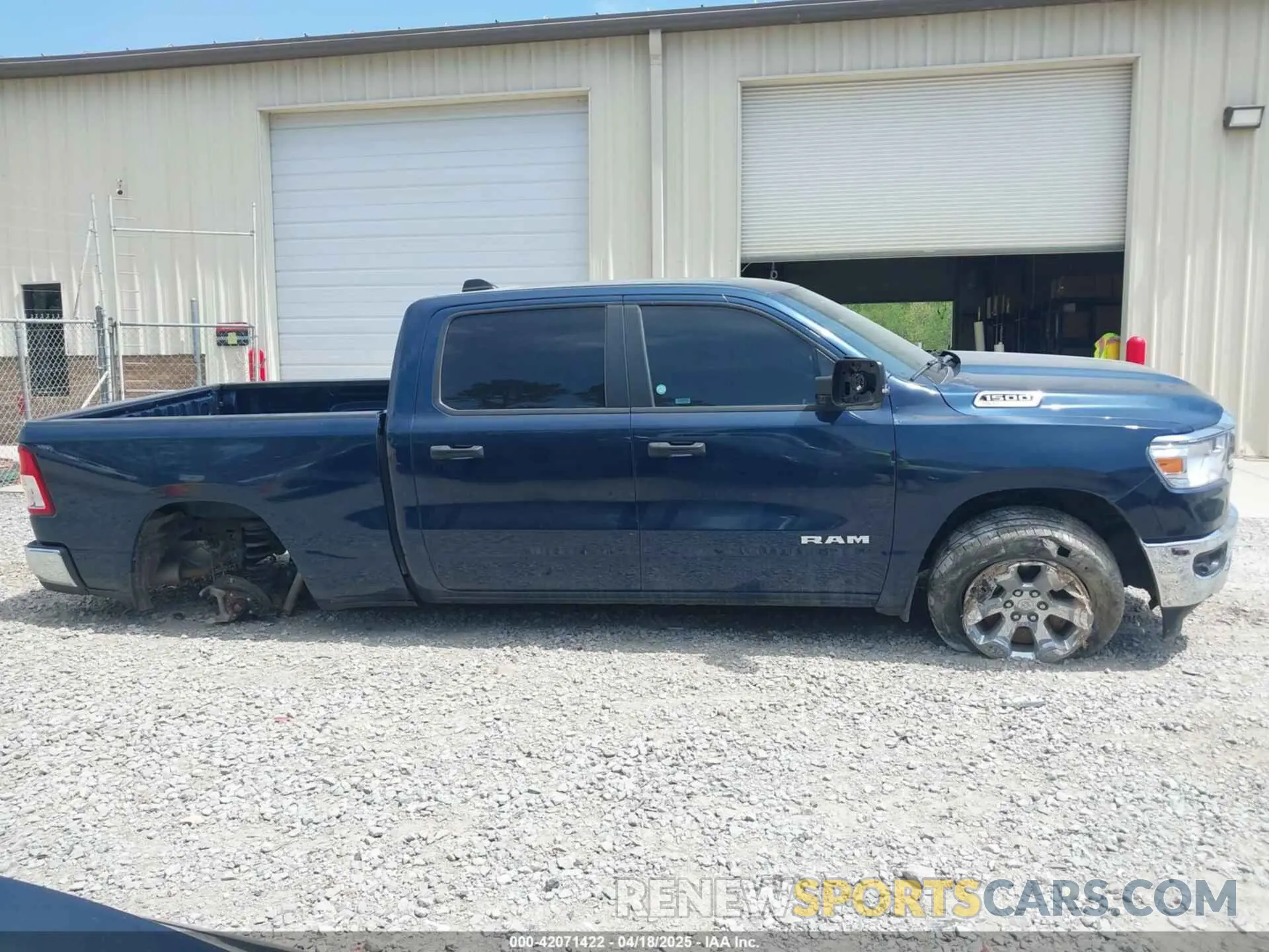13 Photograph of a damaged car 1C6SRFMT1PN542489 RAM 1500 2023