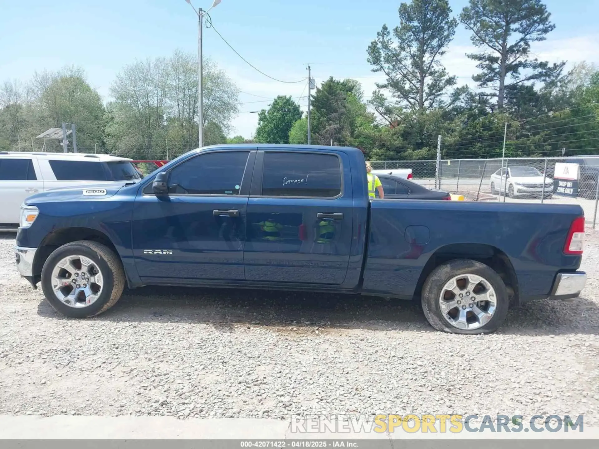 14 Photograph of a damaged car 1C6SRFMT1PN542489 RAM 1500 2023