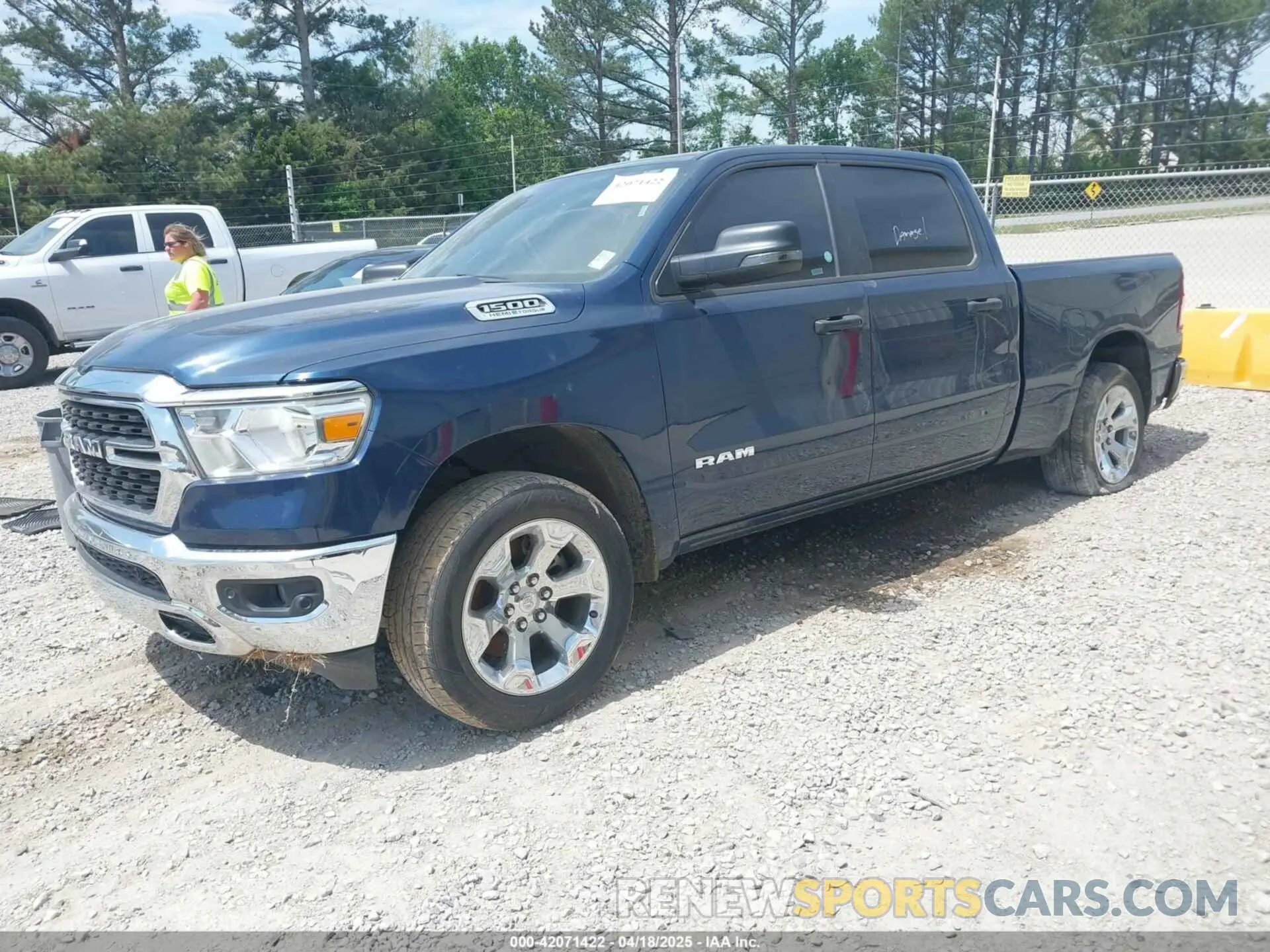2 Photograph of a damaged car 1C6SRFMT1PN542489 RAM 1500 2023