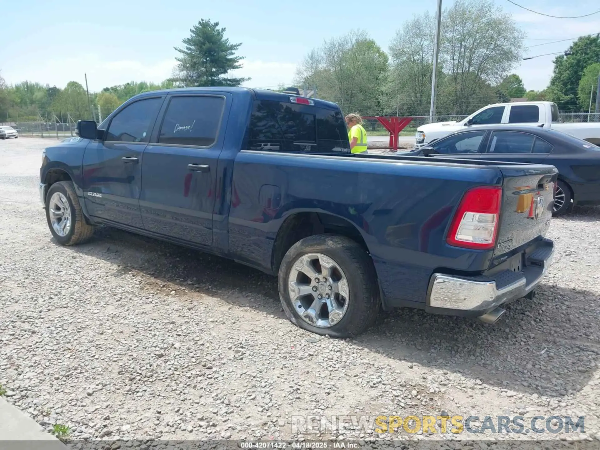 3 Photograph of a damaged car 1C6SRFMT1PN542489 RAM 1500 2023
