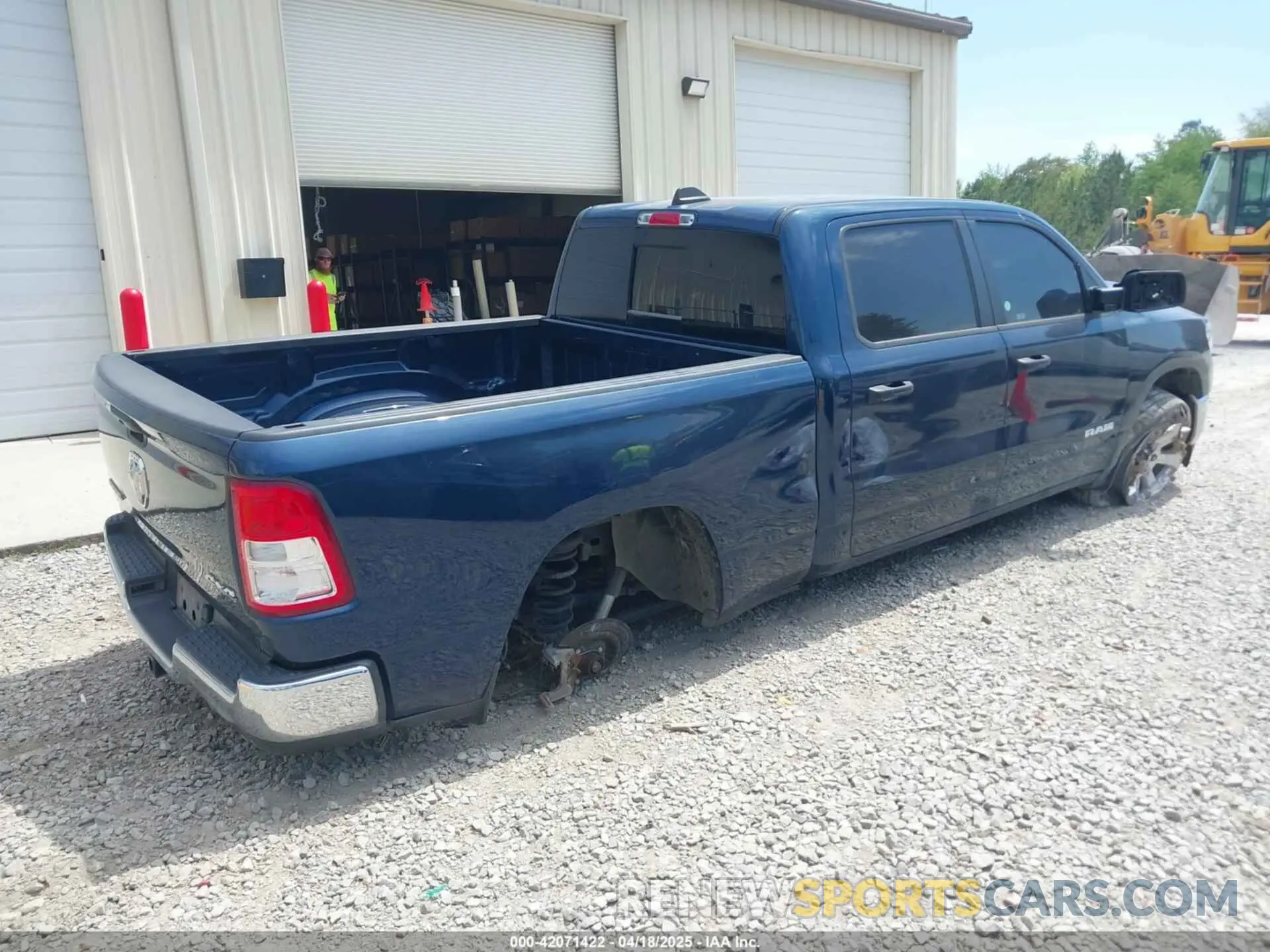 4 Photograph of a damaged car 1C6SRFMT1PN542489 RAM 1500 2023