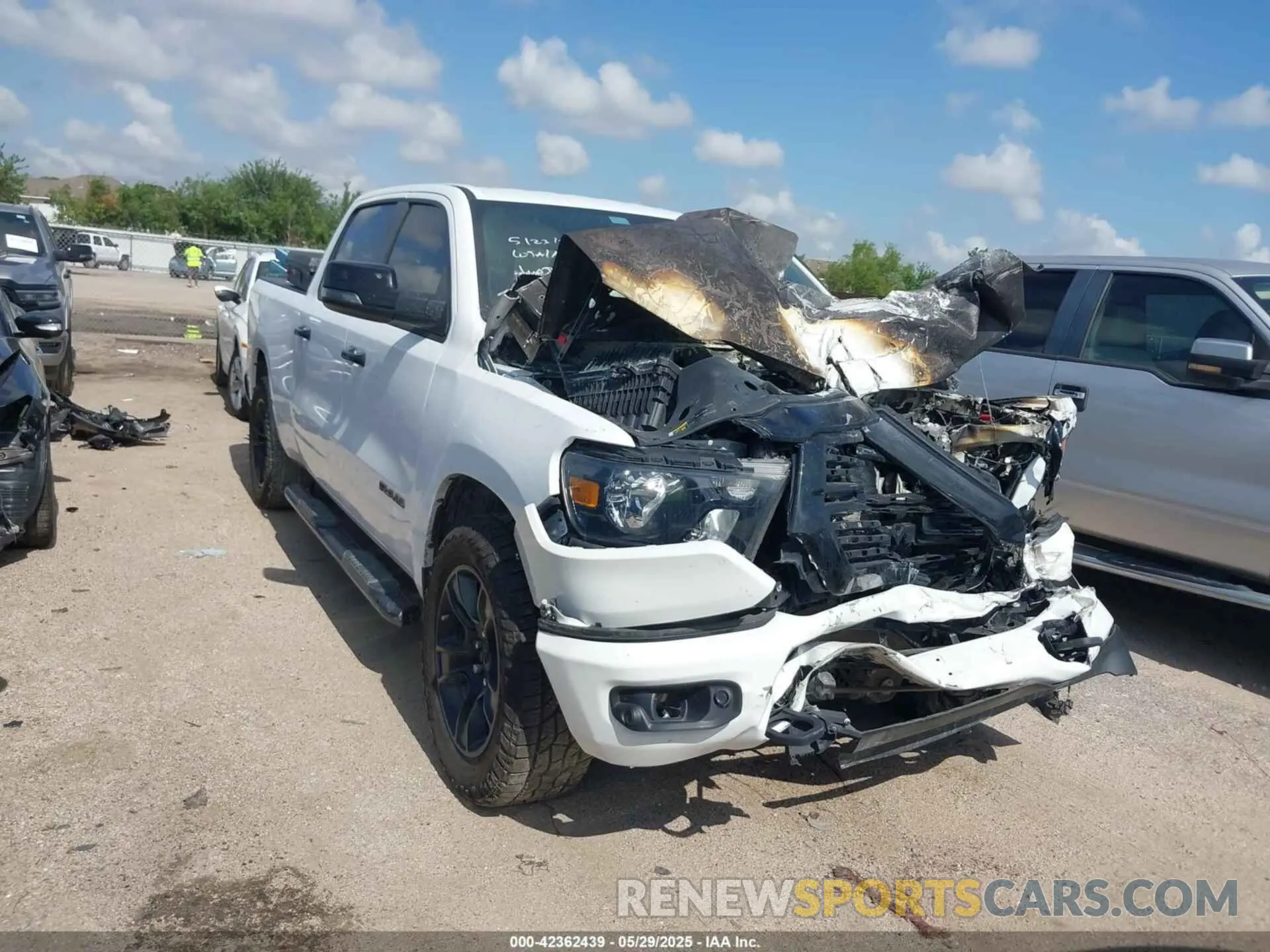 1 Photograph of a damaged car 1C6SRFMT3PN636003 RAM 1500 2023