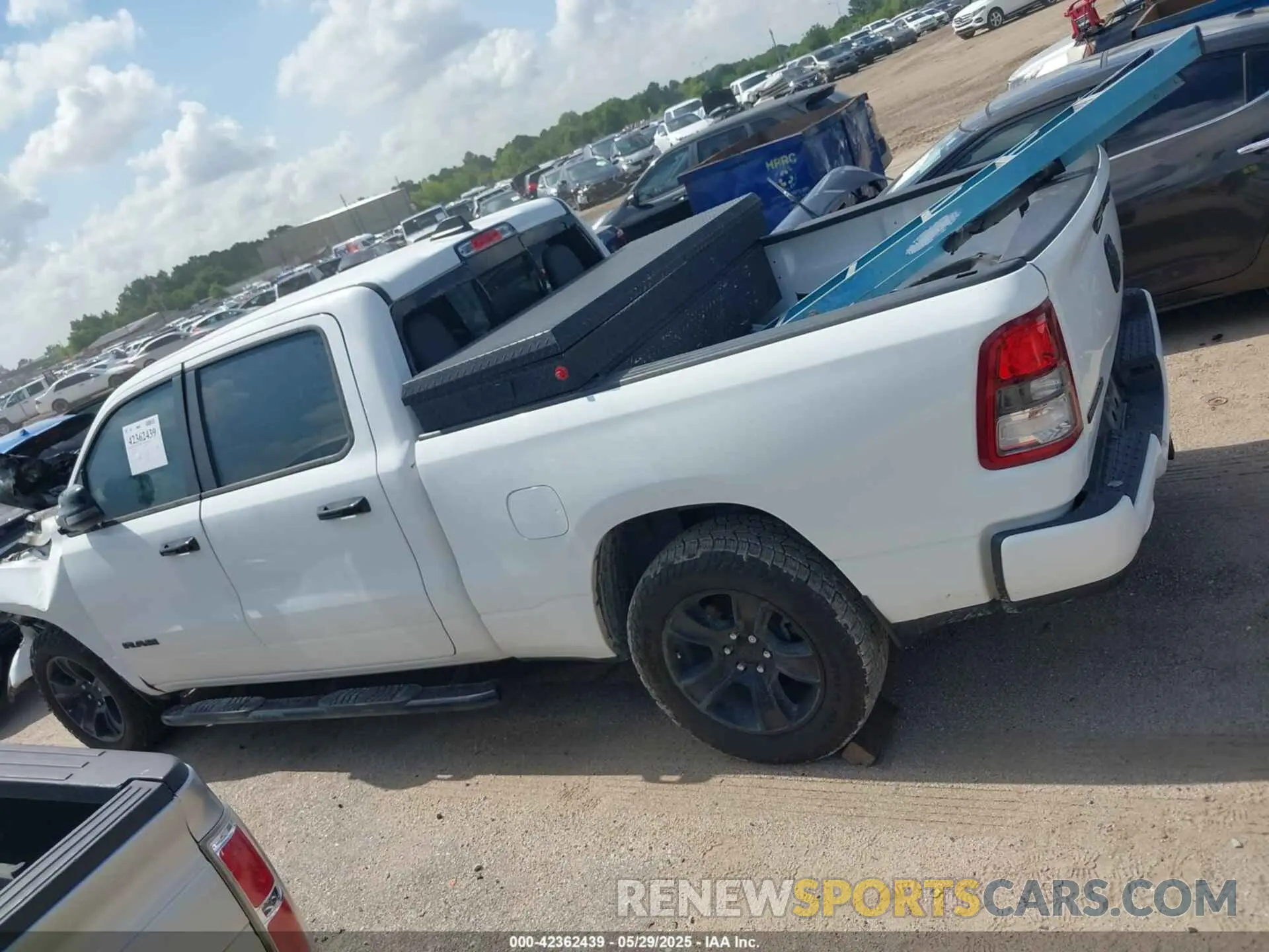 14 Photograph of a damaged car 1C6SRFMT3PN636003 RAM 1500 2023