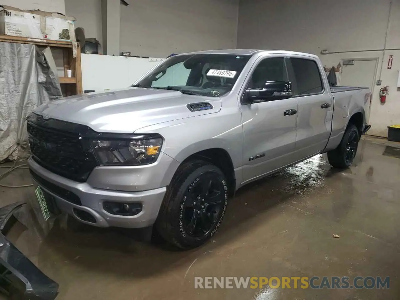 1 Photograph of a damaged car 1C6SRFMT5PN637251 RAM 1500 2023