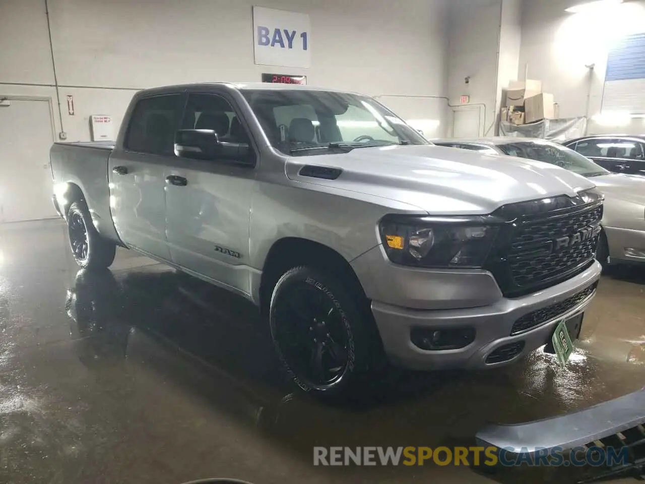 4 Photograph of a damaged car 1C6SRFMT5PN637251 RAM 1500 2023