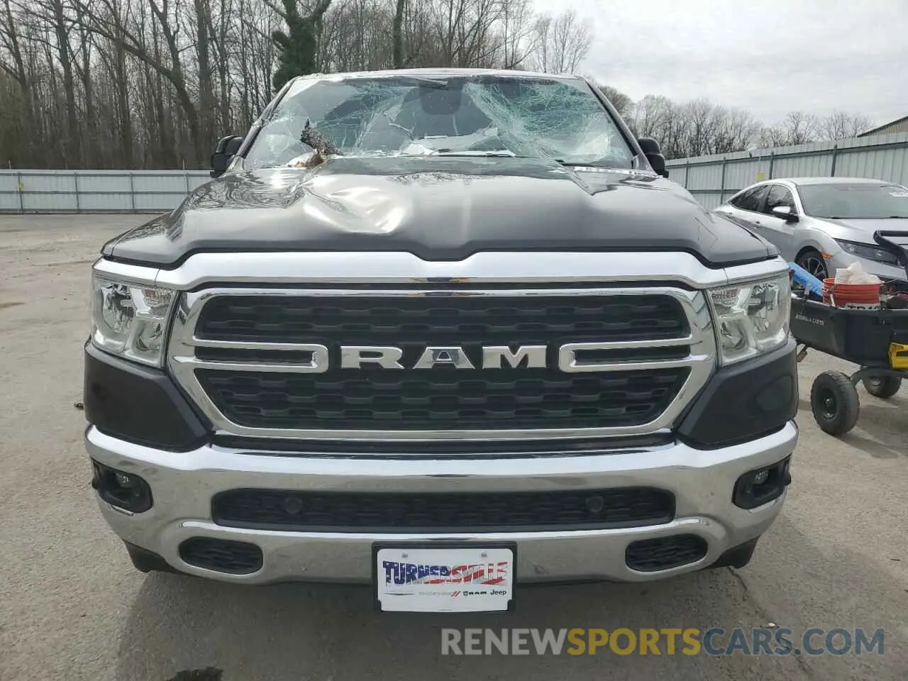 5 Photograph of a damaged car 1C6SRFMT9PN587454 RAM 1500 2023
