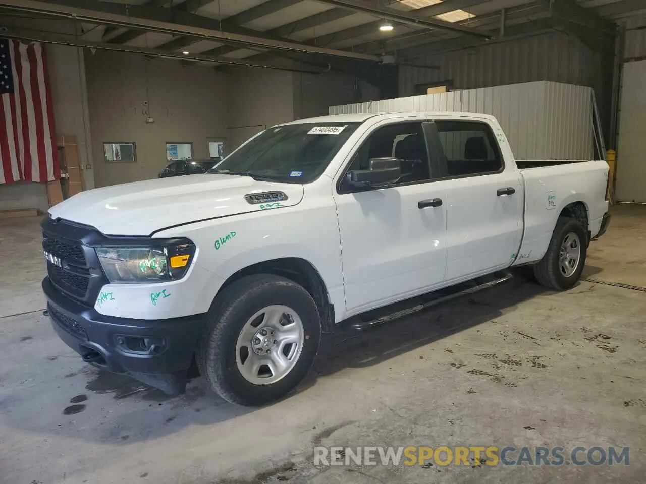 1 Photograph of a damaged car 1C6SRFNT1PN537324 RAM 1500 2023