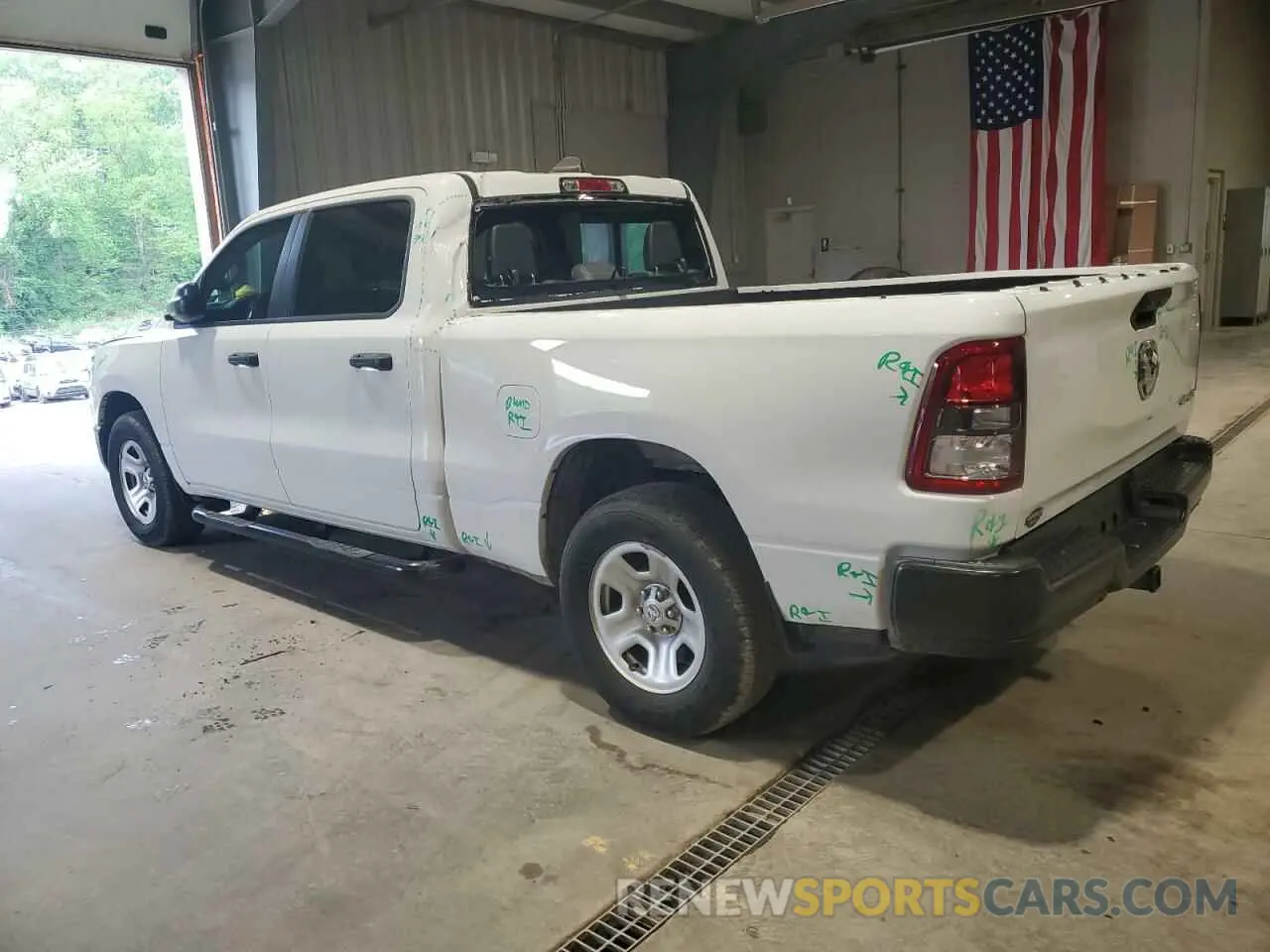 2 Photograph of a damaged car 1C6SRFNT1PN537324 RAM 1500 2023