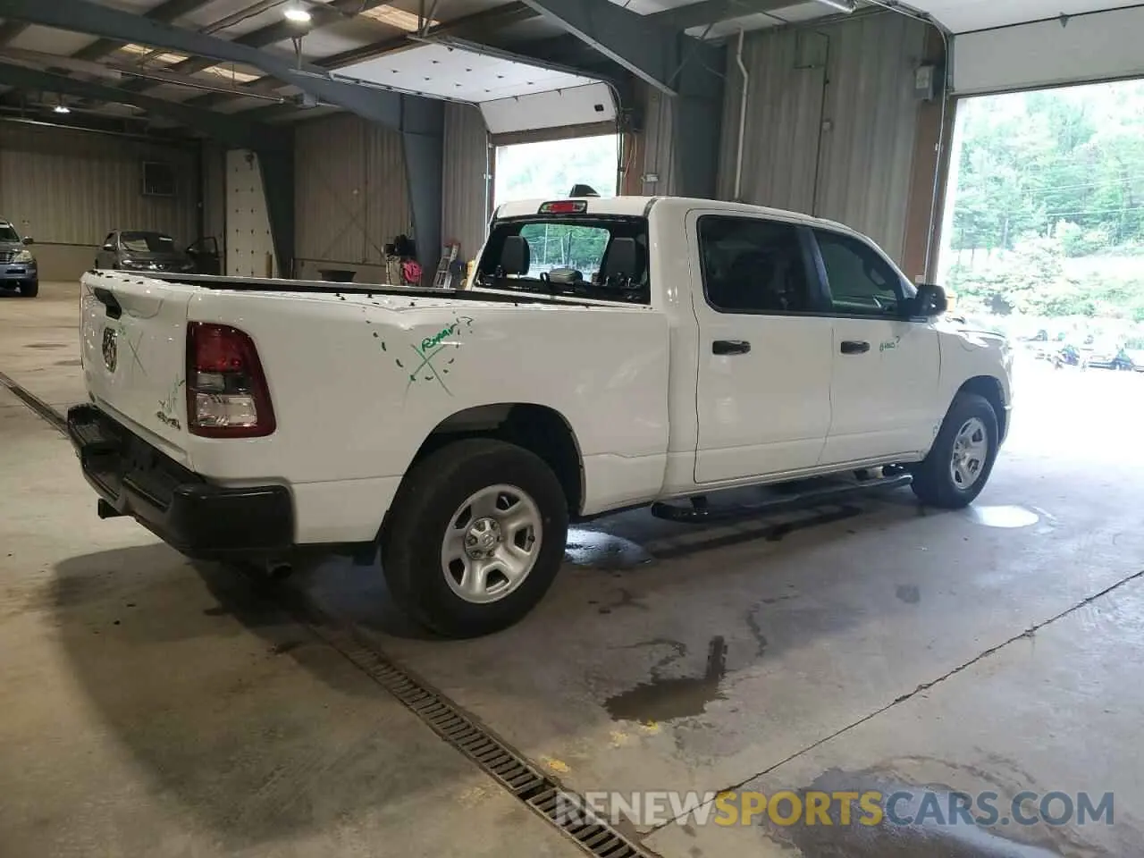 3 Photograph of a damaged car 1C6SRFNT1PN537324 RAM 1500 2023