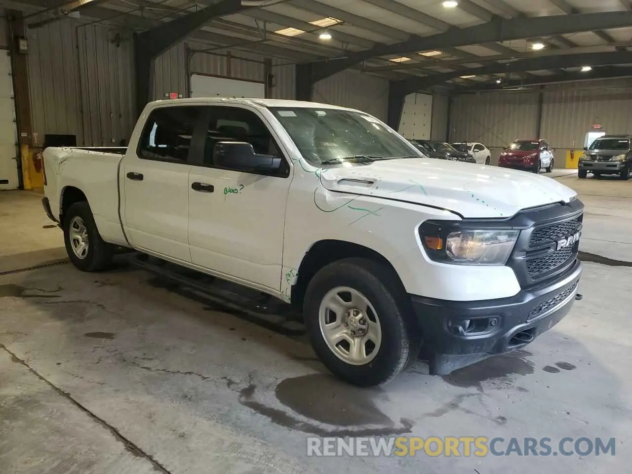 4 Photograph of a damaged car 1C6SRFNT1PN537324 RAM 1500 2023