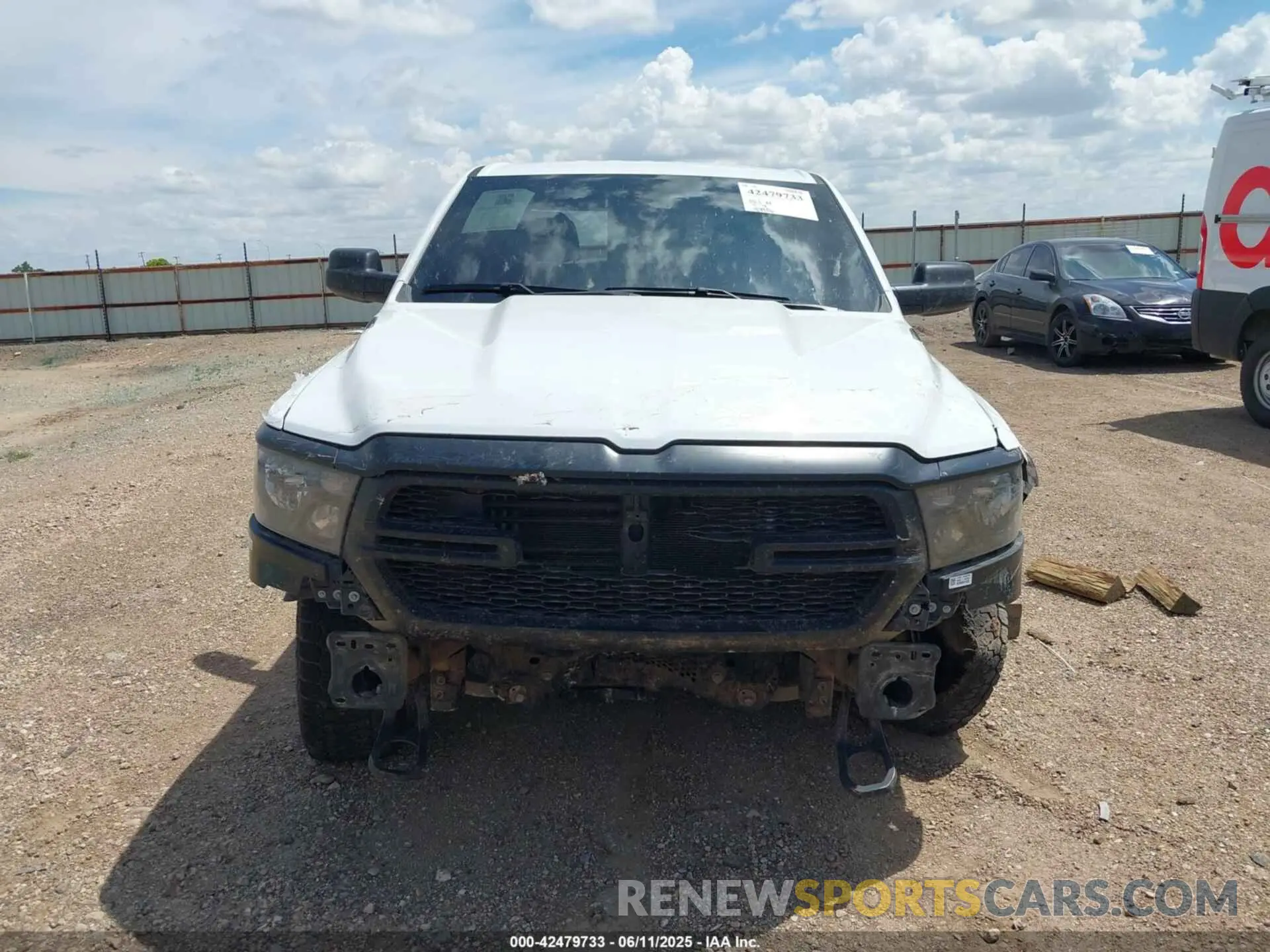 13 Photograph of a damaged car 1C6SRFNT7PN593705 RAM 1500 2023