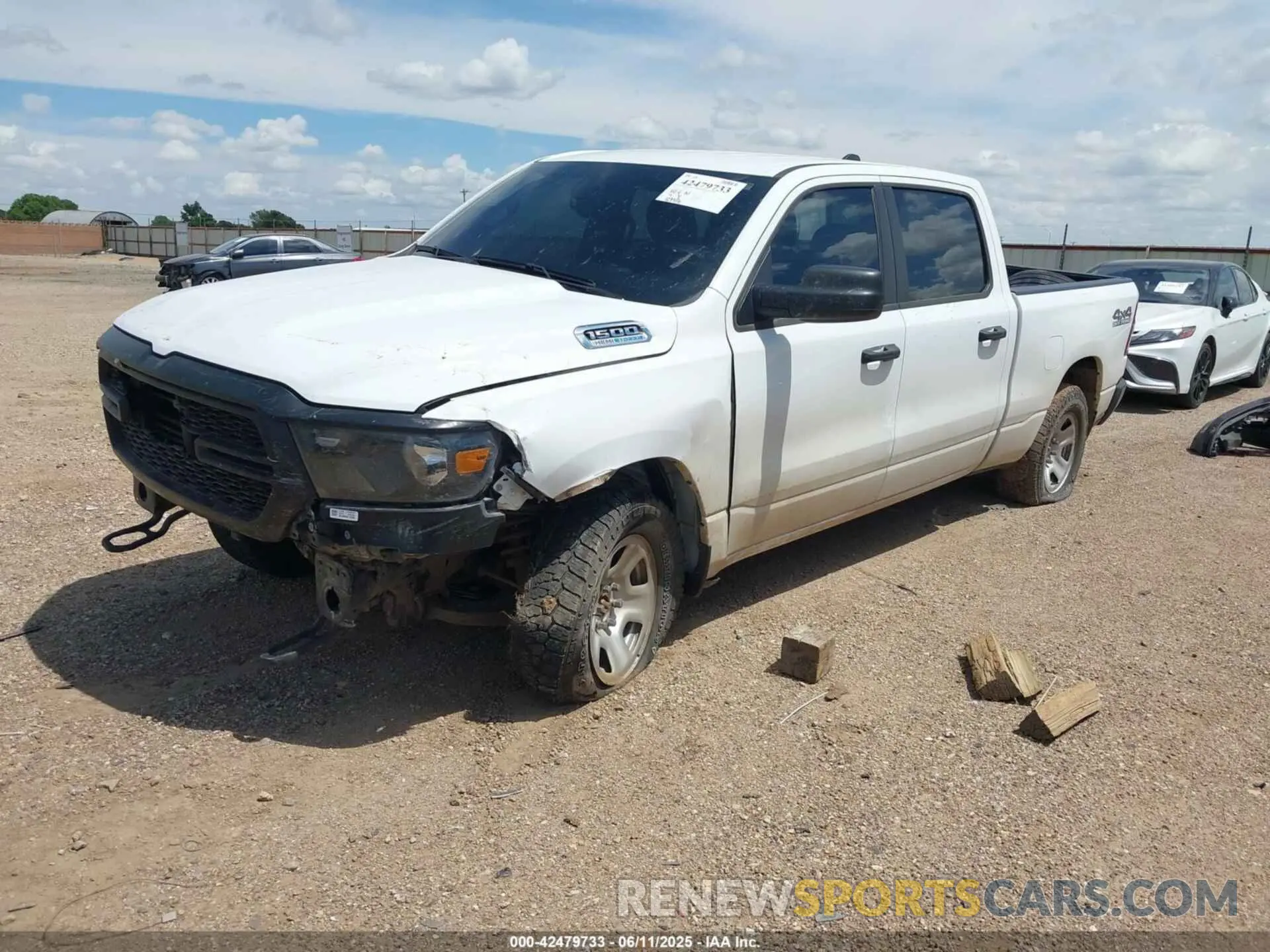 2 Photograph of a damaged car 1C6SRFNT7PN593705 RAM 1500 2023