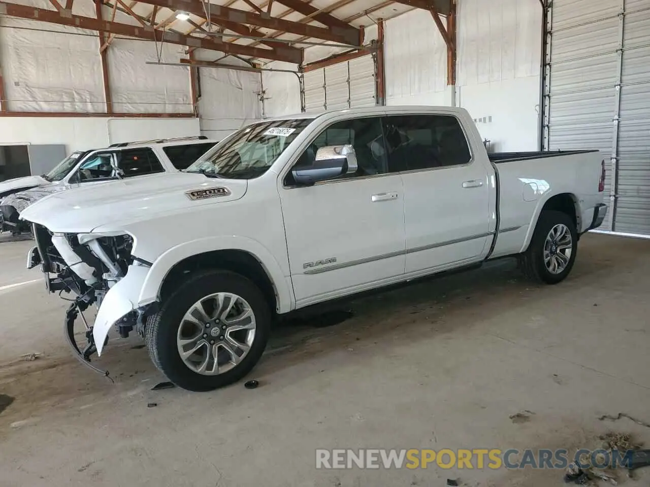 1 Photograph of a damaged car 1C6SRFPT8PN586582 RAM 1500 2023