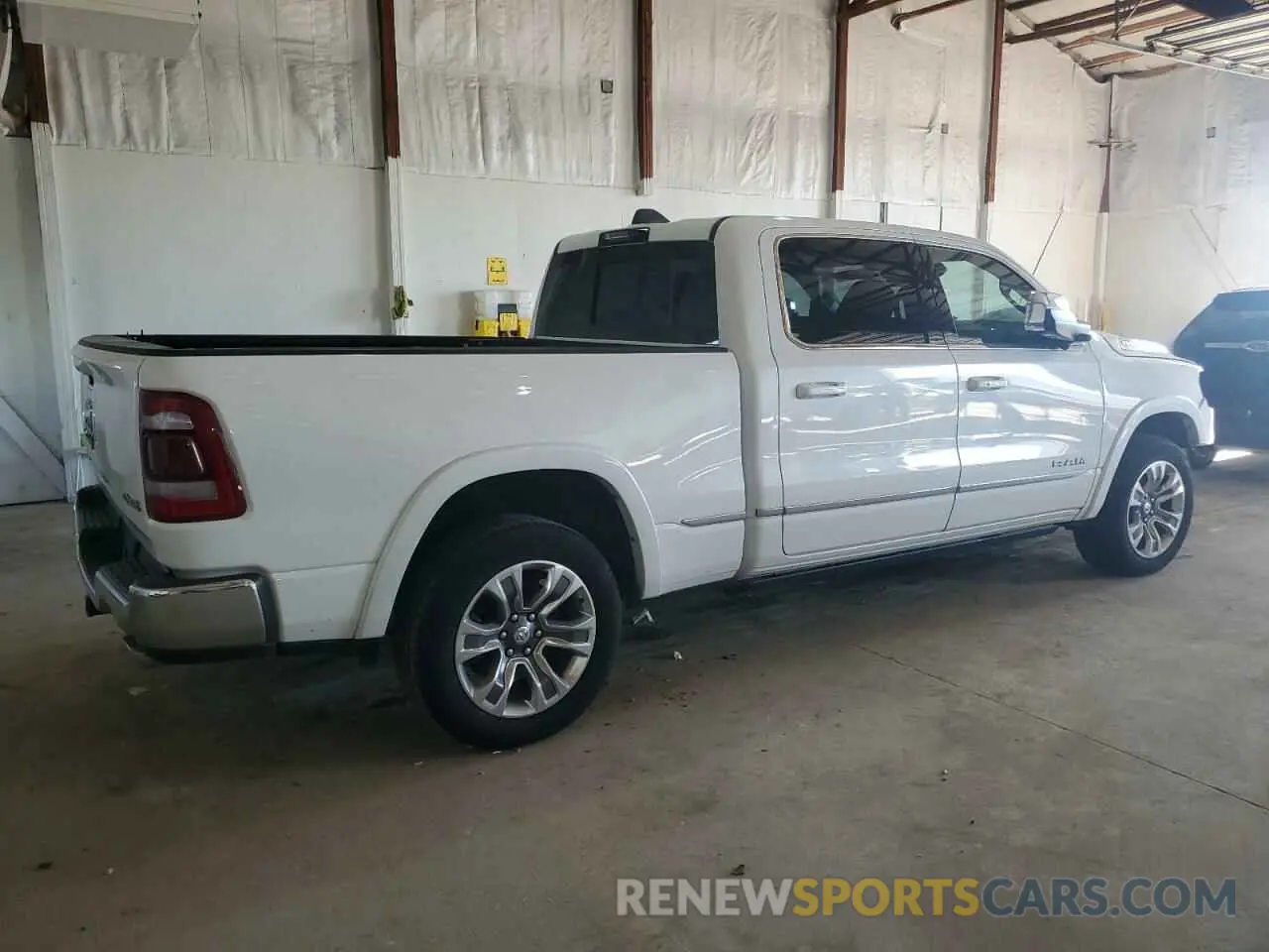 3 Photograph of a damaged car 1C6SRFPT8PN586582 RAM 1500 2023