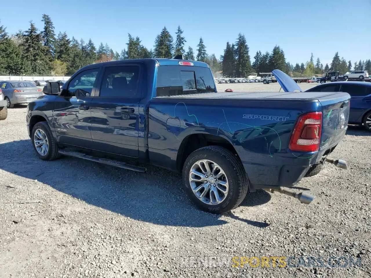 2 Photograph of a damaged car 1C6SRFRT1PN589871 RAM 1500 2023