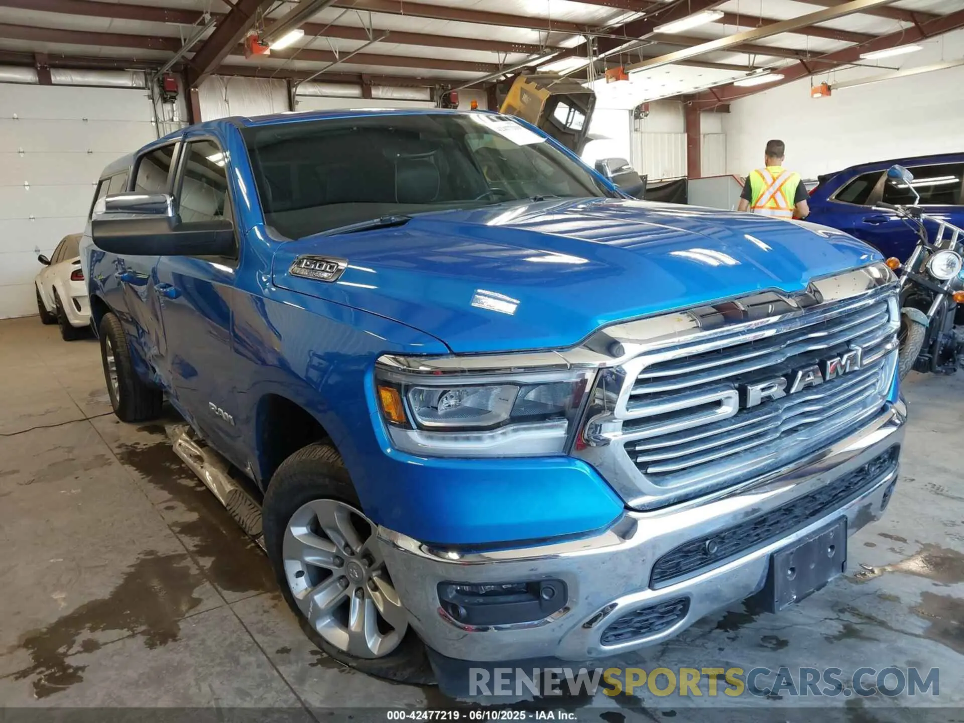 1 Photograph of a damaged car 1C6SRFRT4PN596782 RAM 1500 2023
