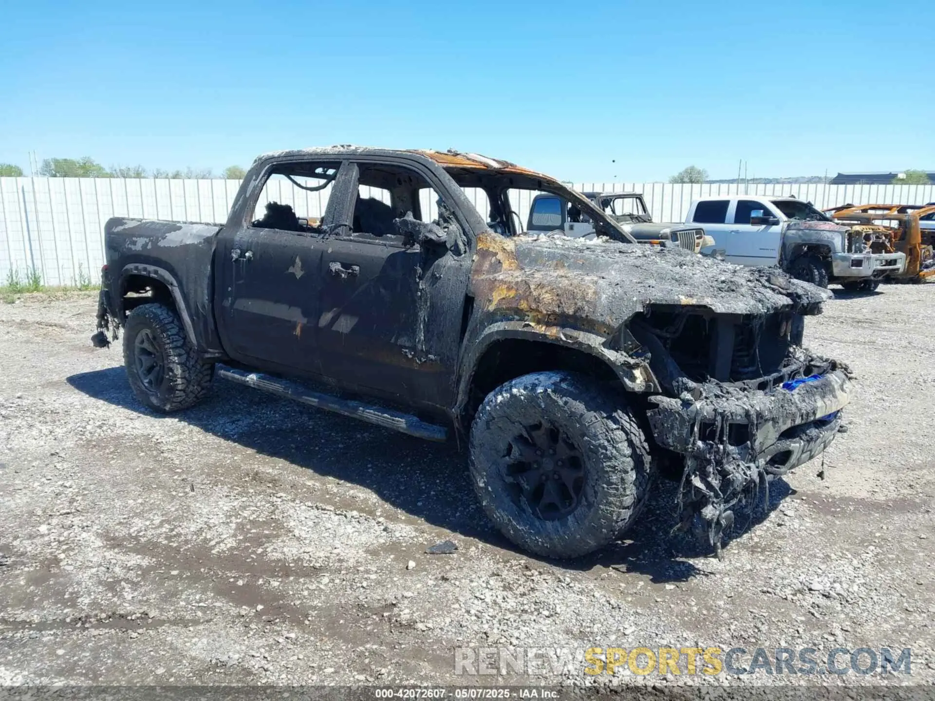 1 Photograph of a damaged car 1C6SRFU92PN500787 RAM 1500 2023