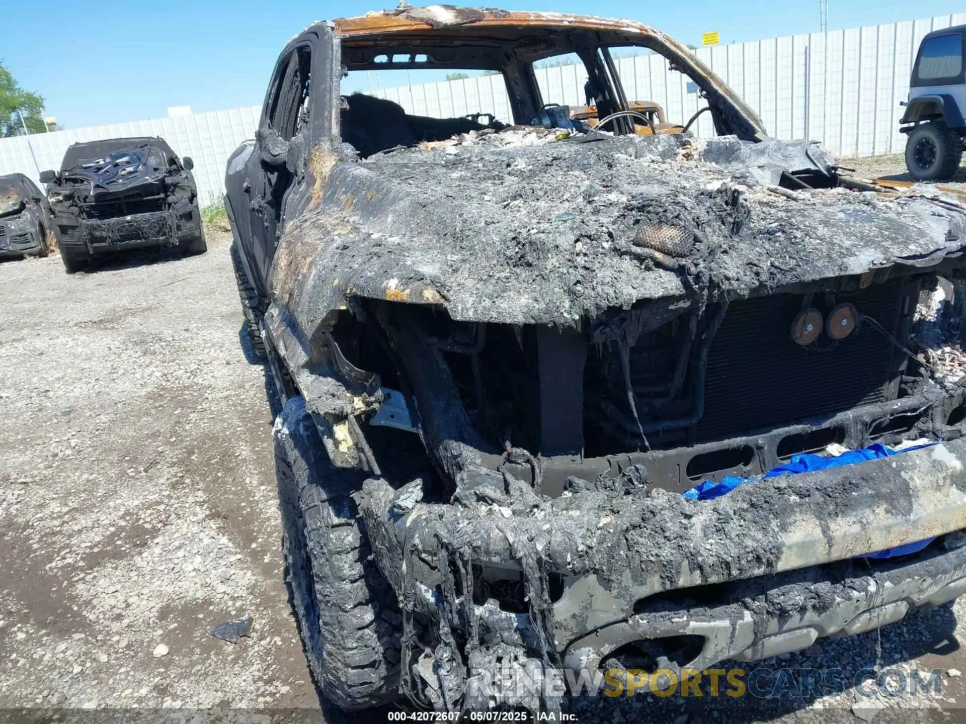 12 Photograph of a damaged car 1C6SRFU92PN500787 RAM 1500 2023