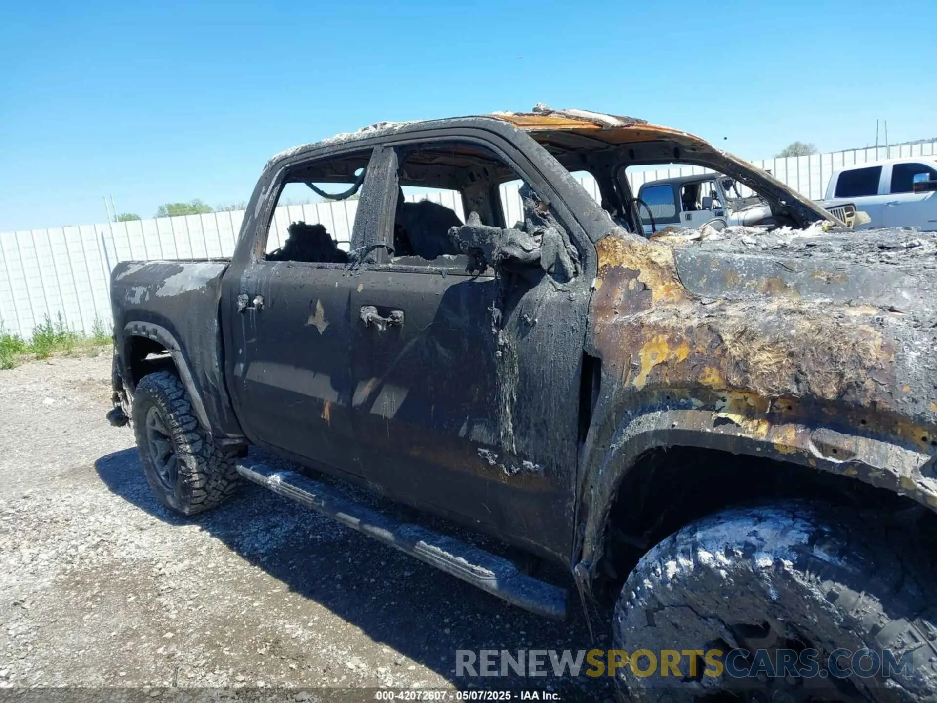 13 Photograph of a damaged car 1C6SRFU92PN500787 RAM 1500 2023