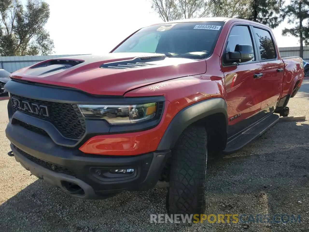 1 Photograph of a damaged car 1C6SRFU92PN530405 RAM 1500 2023