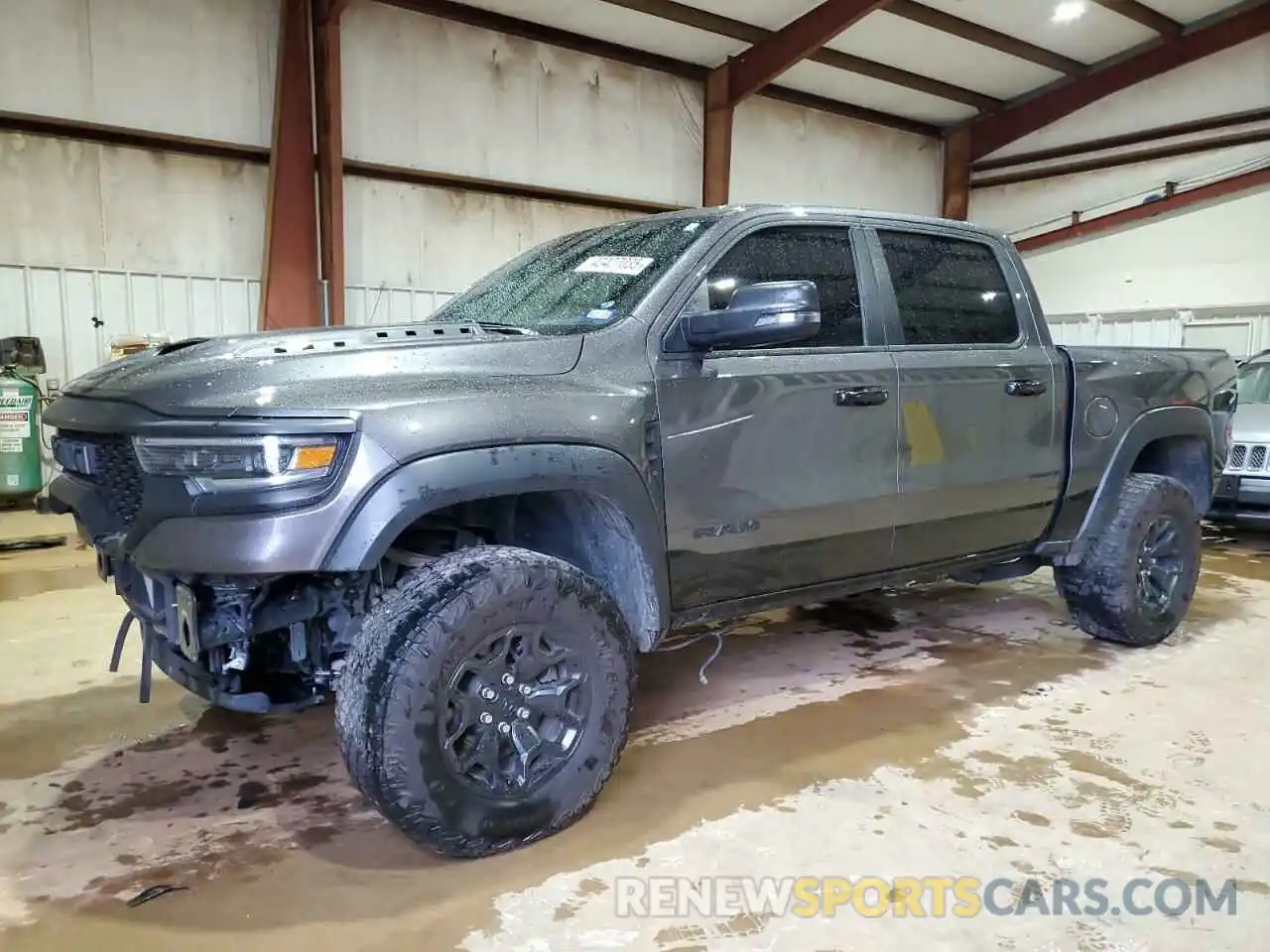 1 Photograph of a damaged car 1C6SRFU93PN500622 RAM 1500 2023