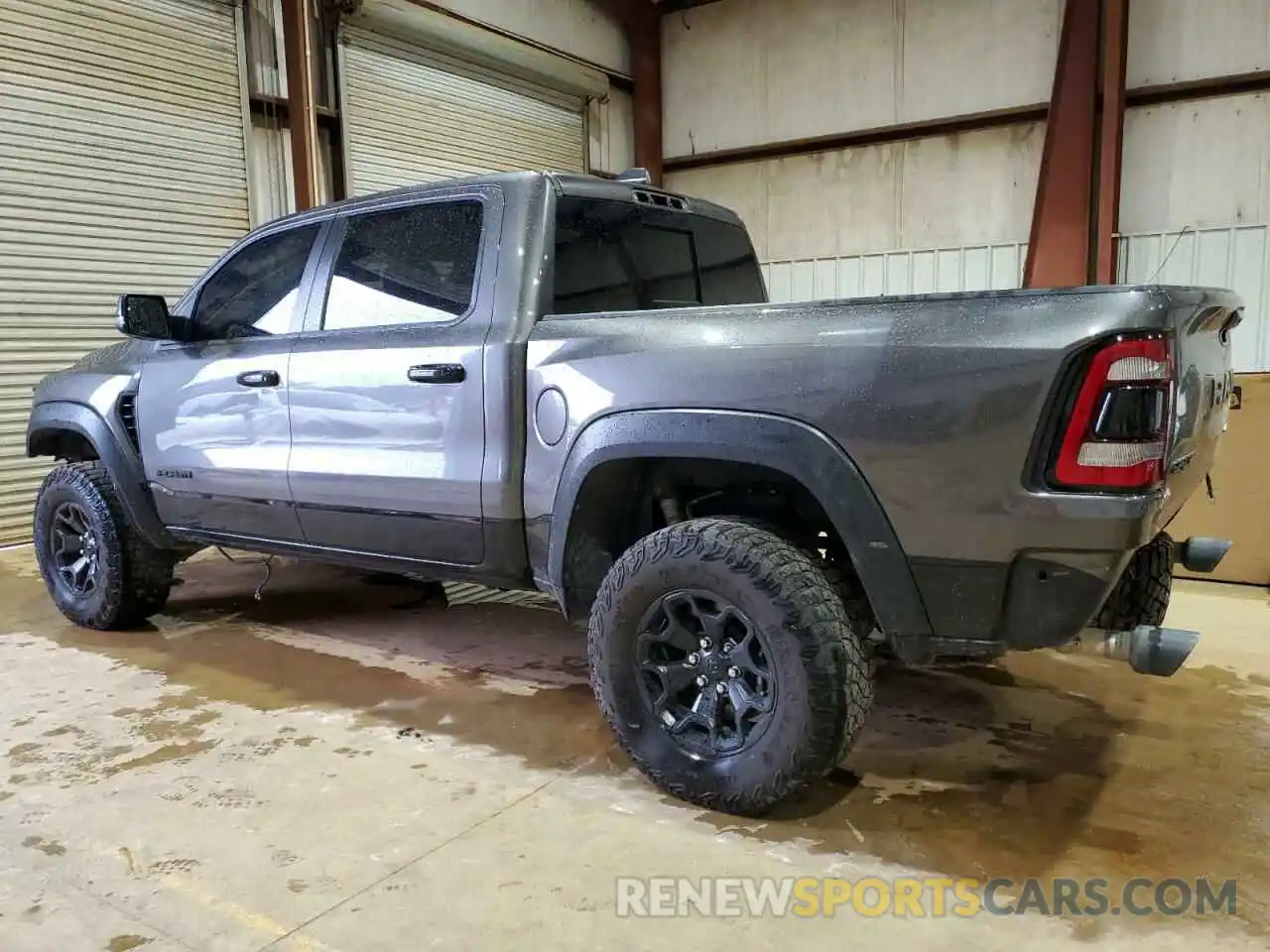 2 Photograph of a damaged car 1C6SRFU93PN500622 RAM 1500 2023