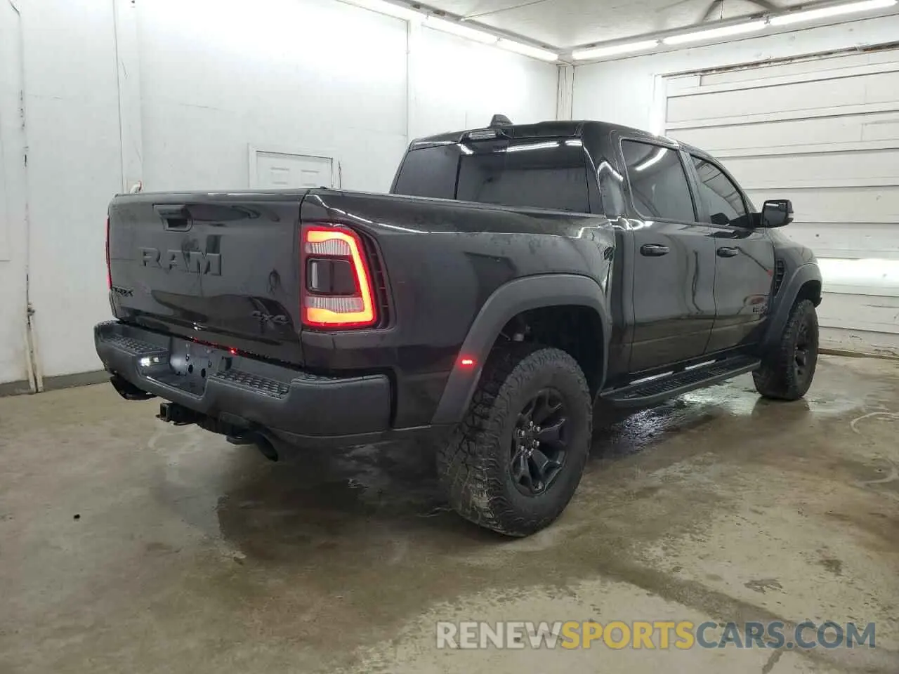 3 Photograph of a damaged car 1C6SRFU93PN551408 RAM 1500 2023