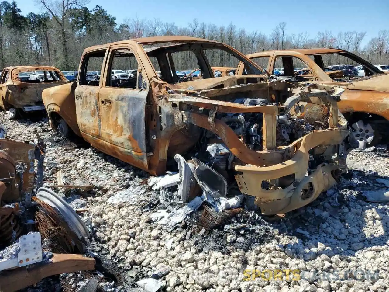 4 Photograph of a damaged car 1C6SRFU93PN572663 RAM 1500 2023