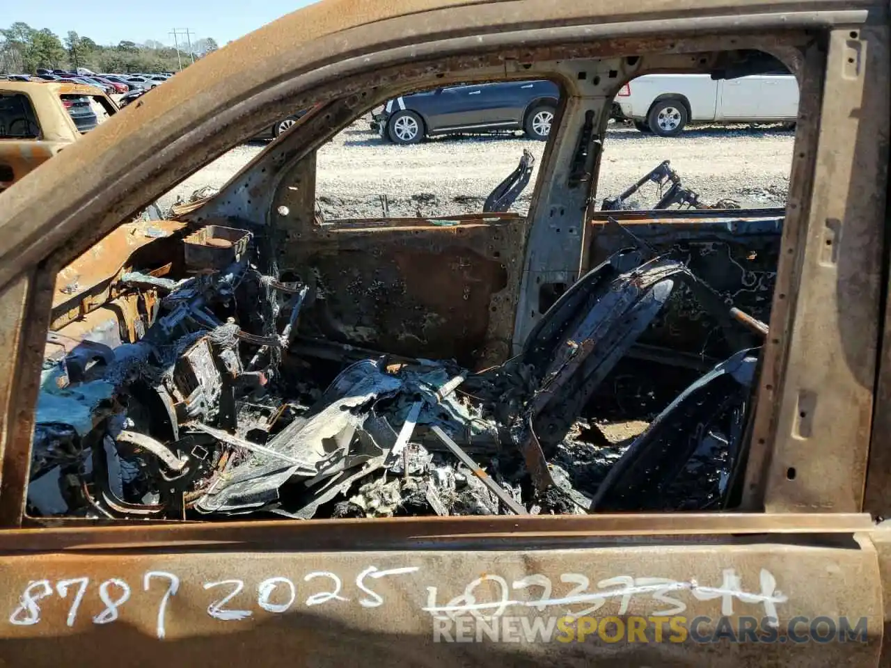 7 Photograph of a damaged car 1C6SRFU93PN572663 RAM 1500 2023