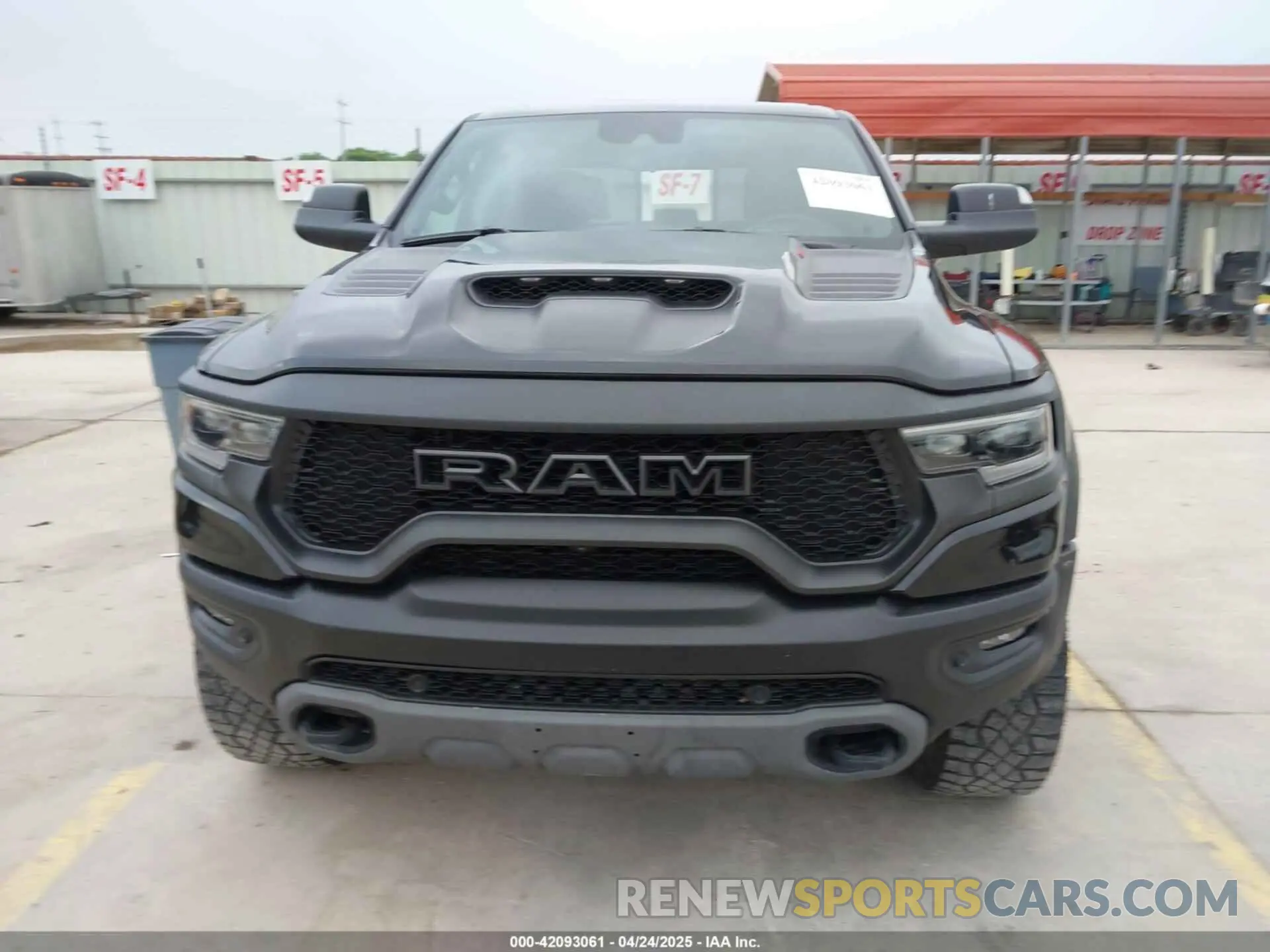 12 Photograph of a damaged car 1C6SRFU93PN572940 RAM 1500 2023