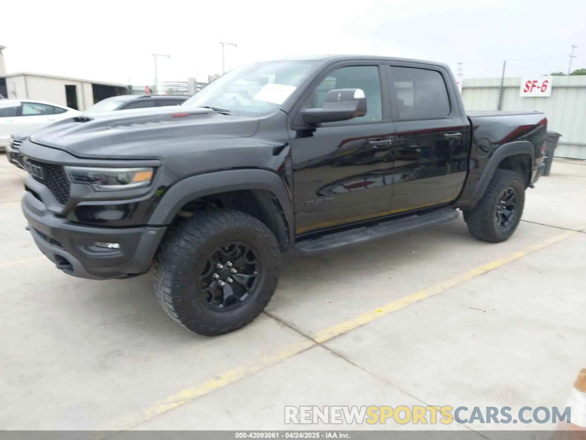 2 Photograph of a damaged car 1C6SRFU93PN572940 RAM 1500 2023
