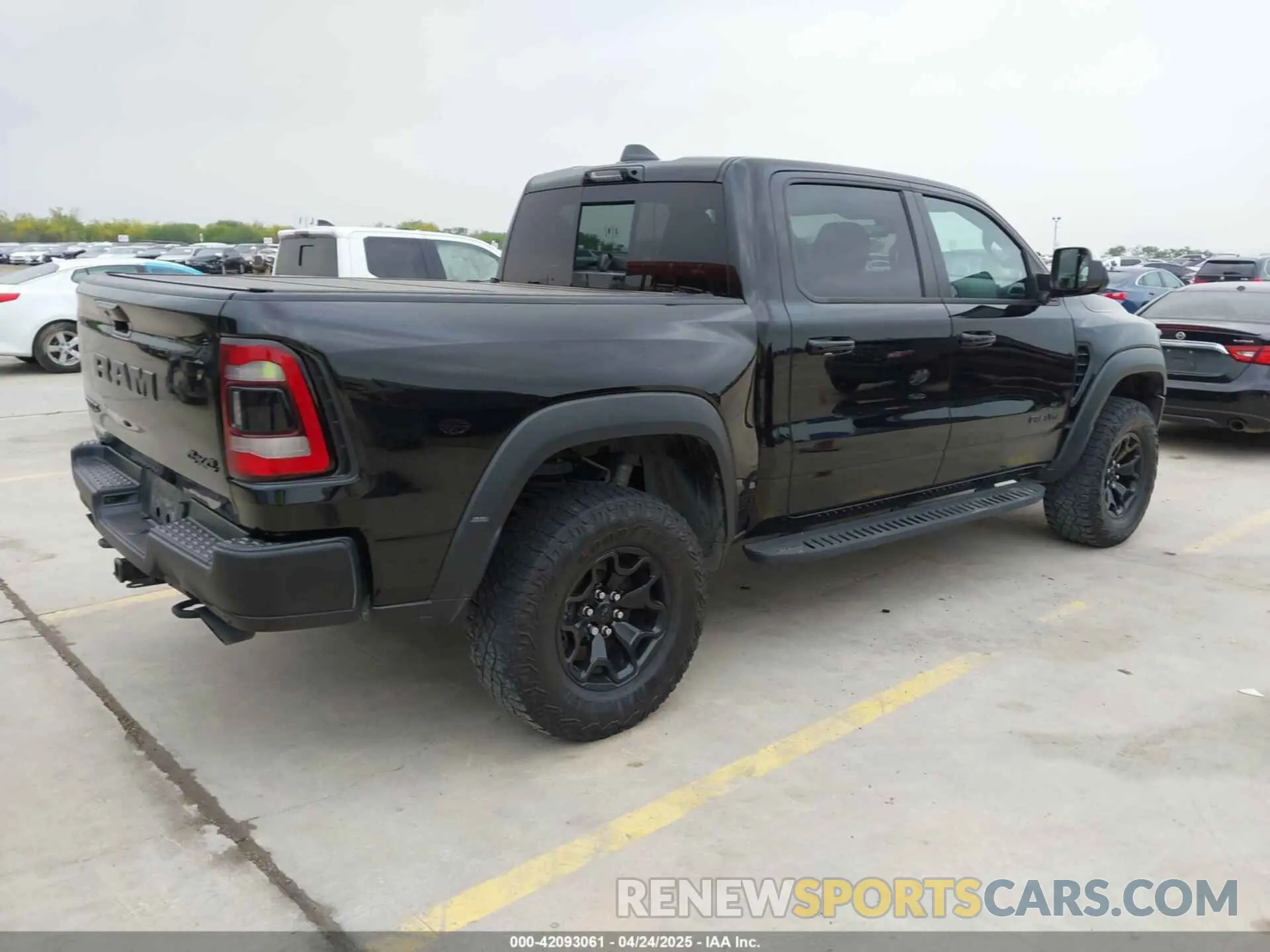 4 Photograph of a damaged car 1C6SRFU93PN572940 RAM 1500 2023
