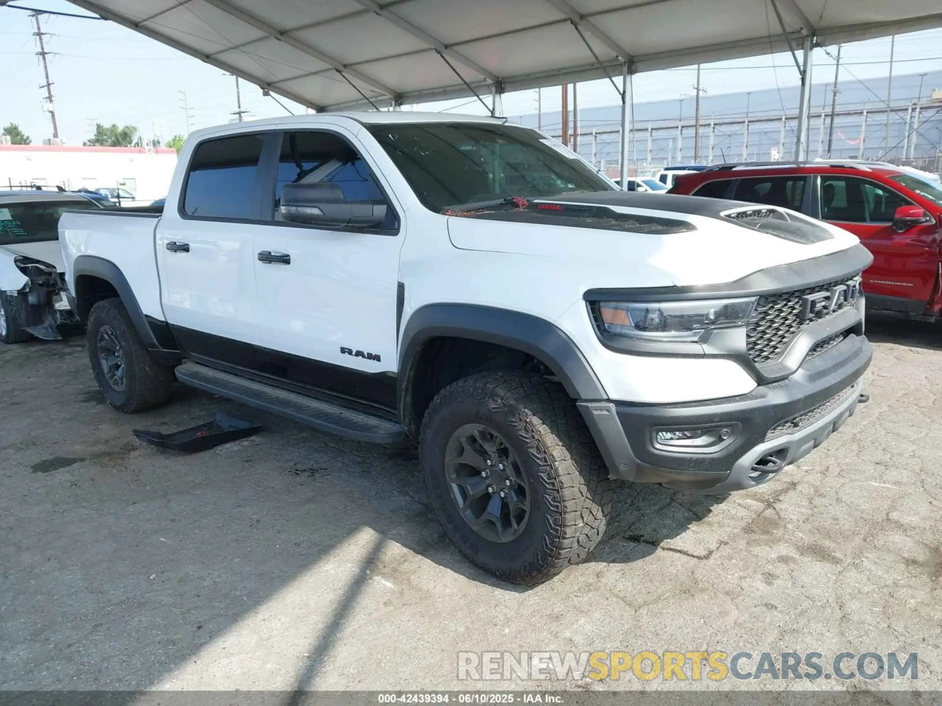 1 Photograph of a damaged car 1C6SRFU93PN585123 RAM 1500 2023