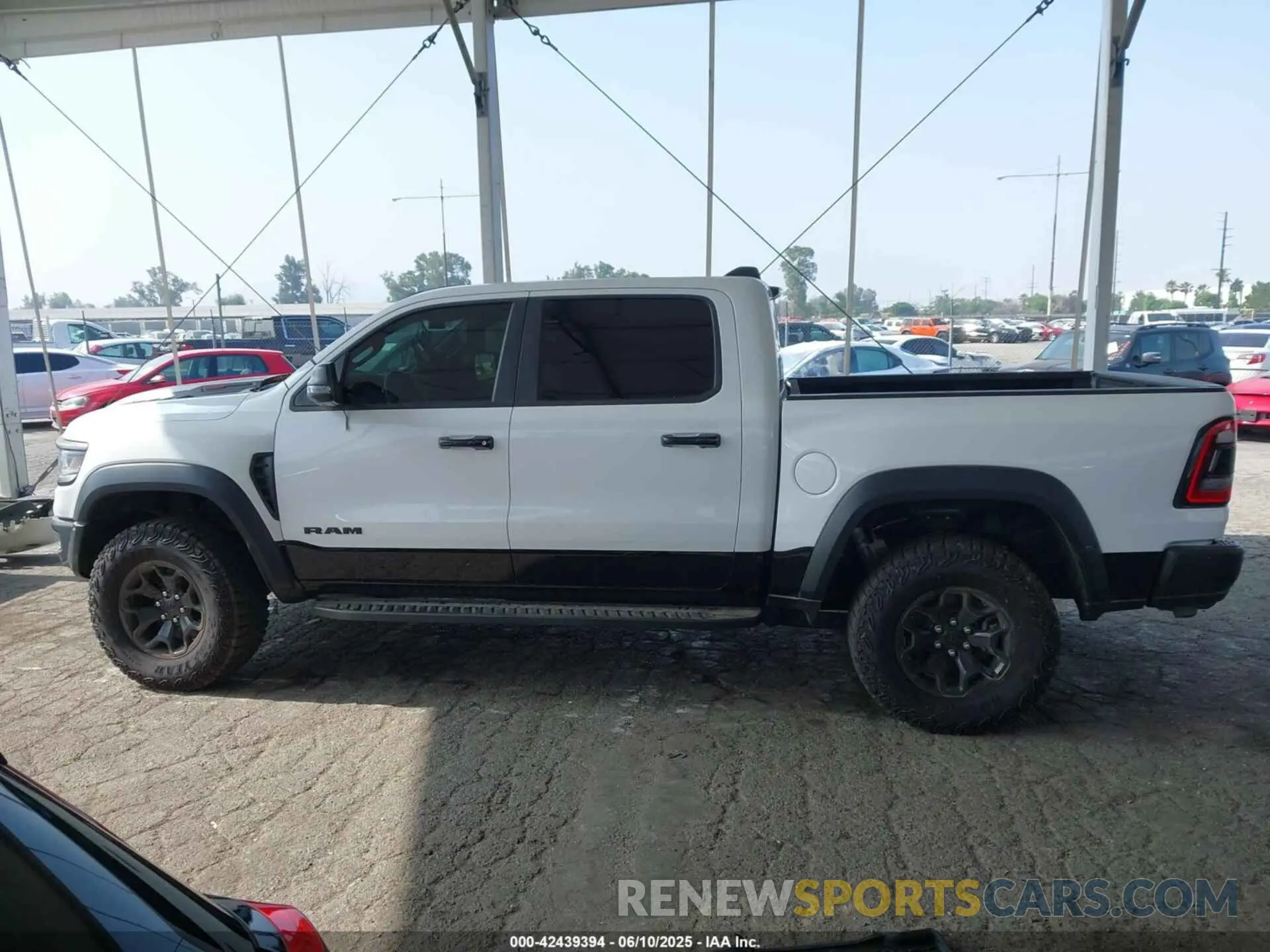 14 Photograph of a damaged car 1C6SRFU93PN585123 RAM 1500 2023