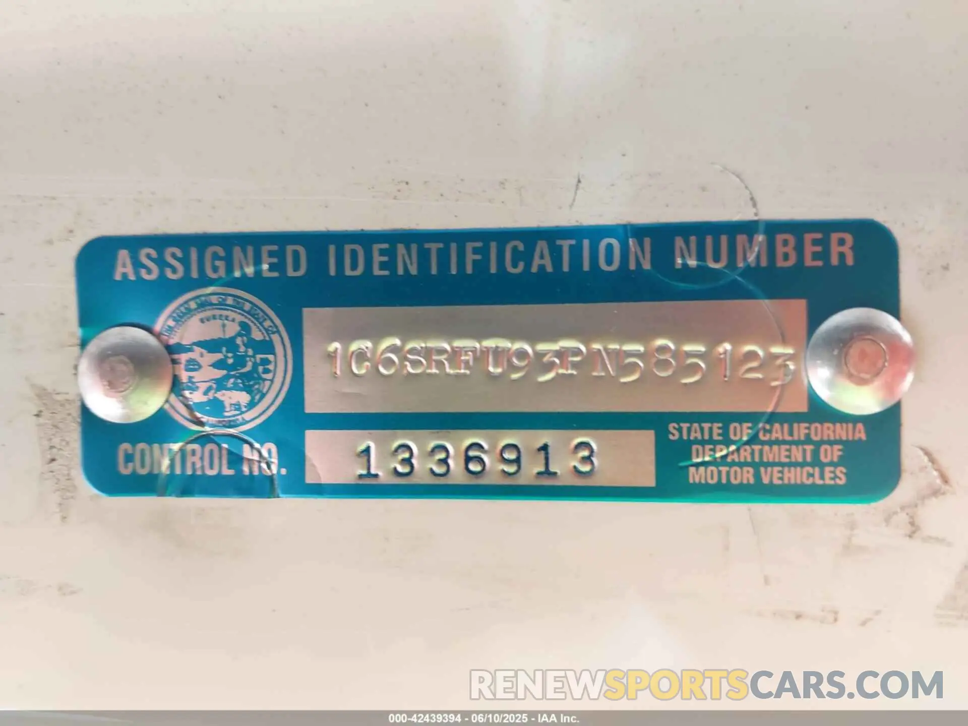 9 Photograph of a damaged car 1C6SRFU93PN585123 RAM 1500 2023