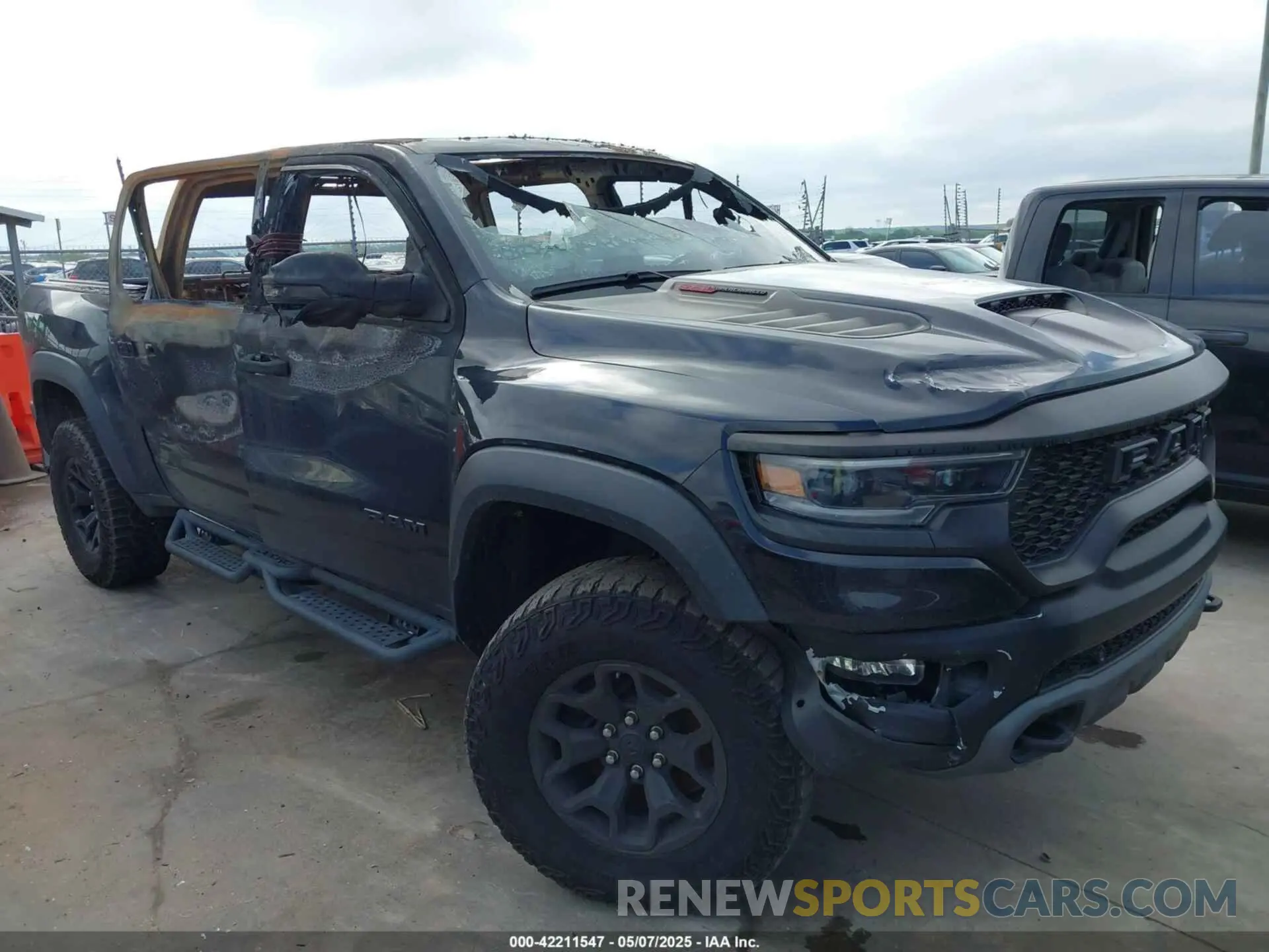 1 Photograph of a damaged car 1C6SRFU94PN509443 RAM 1500 2023