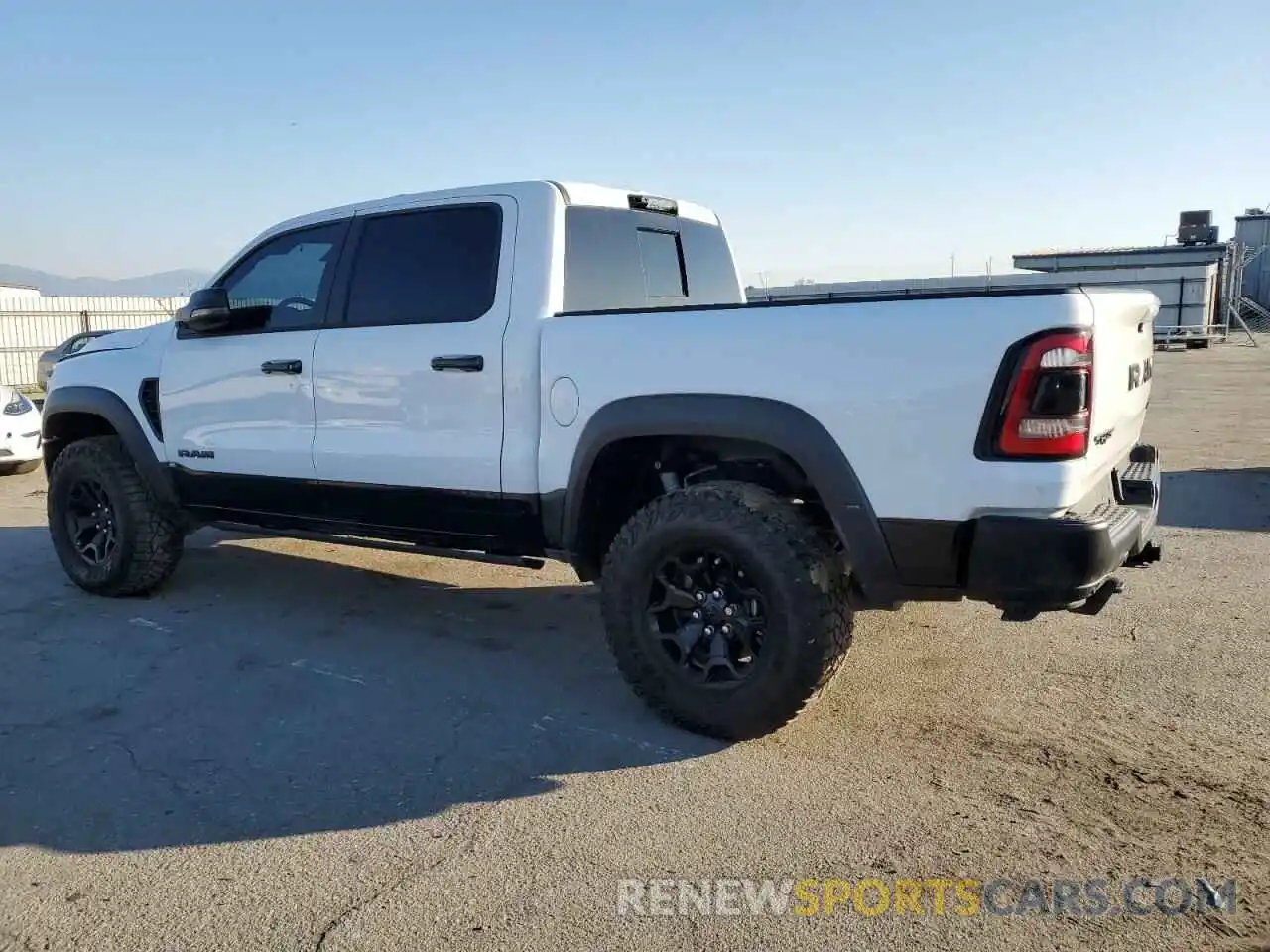 2 Photograph of a damaged car 1C6SRFU96PN503305 RAM 1500 2023