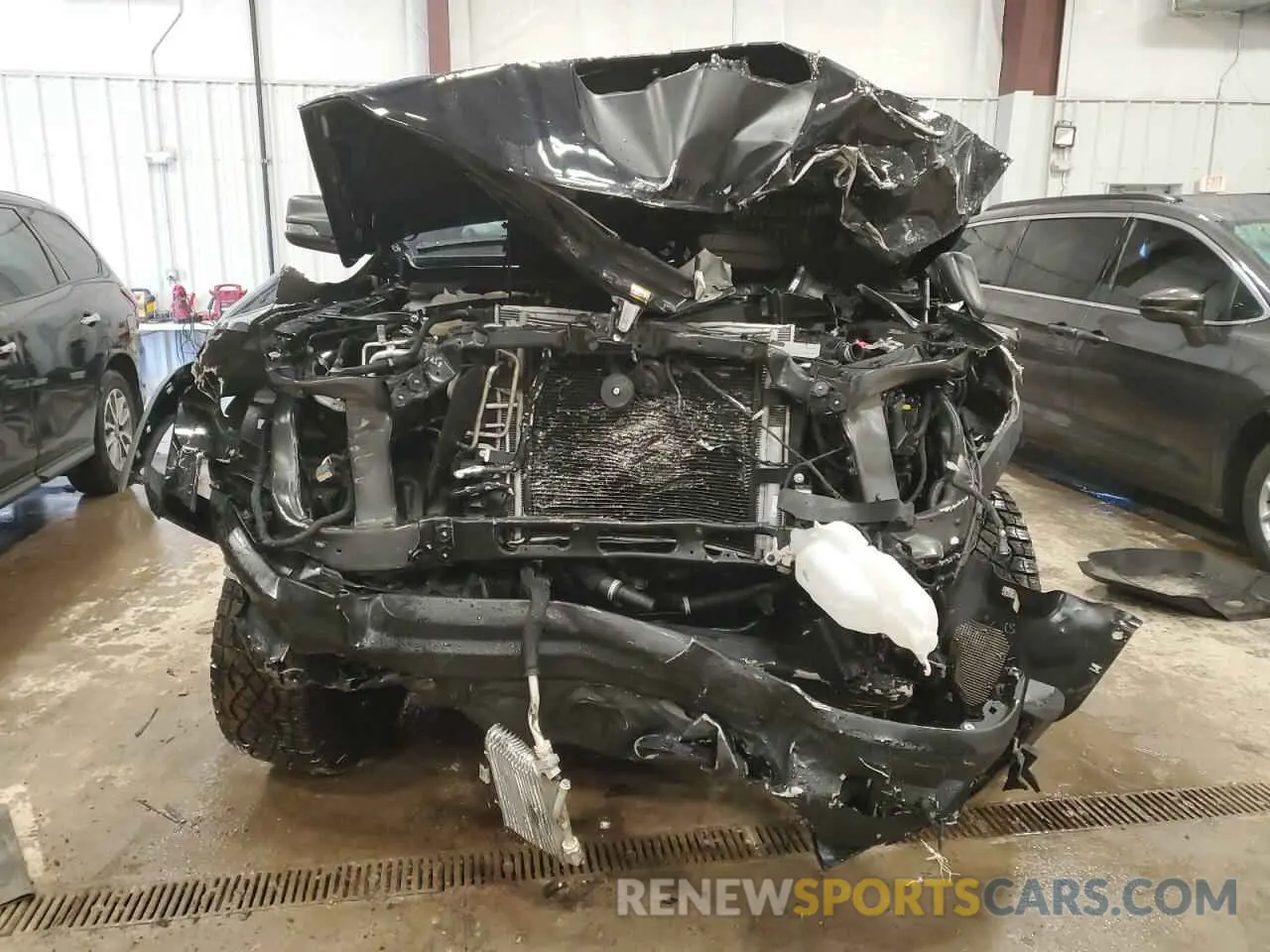 5 Photograph of a damaged car 1C6SRFU98PN511499 RAM 1500 2023