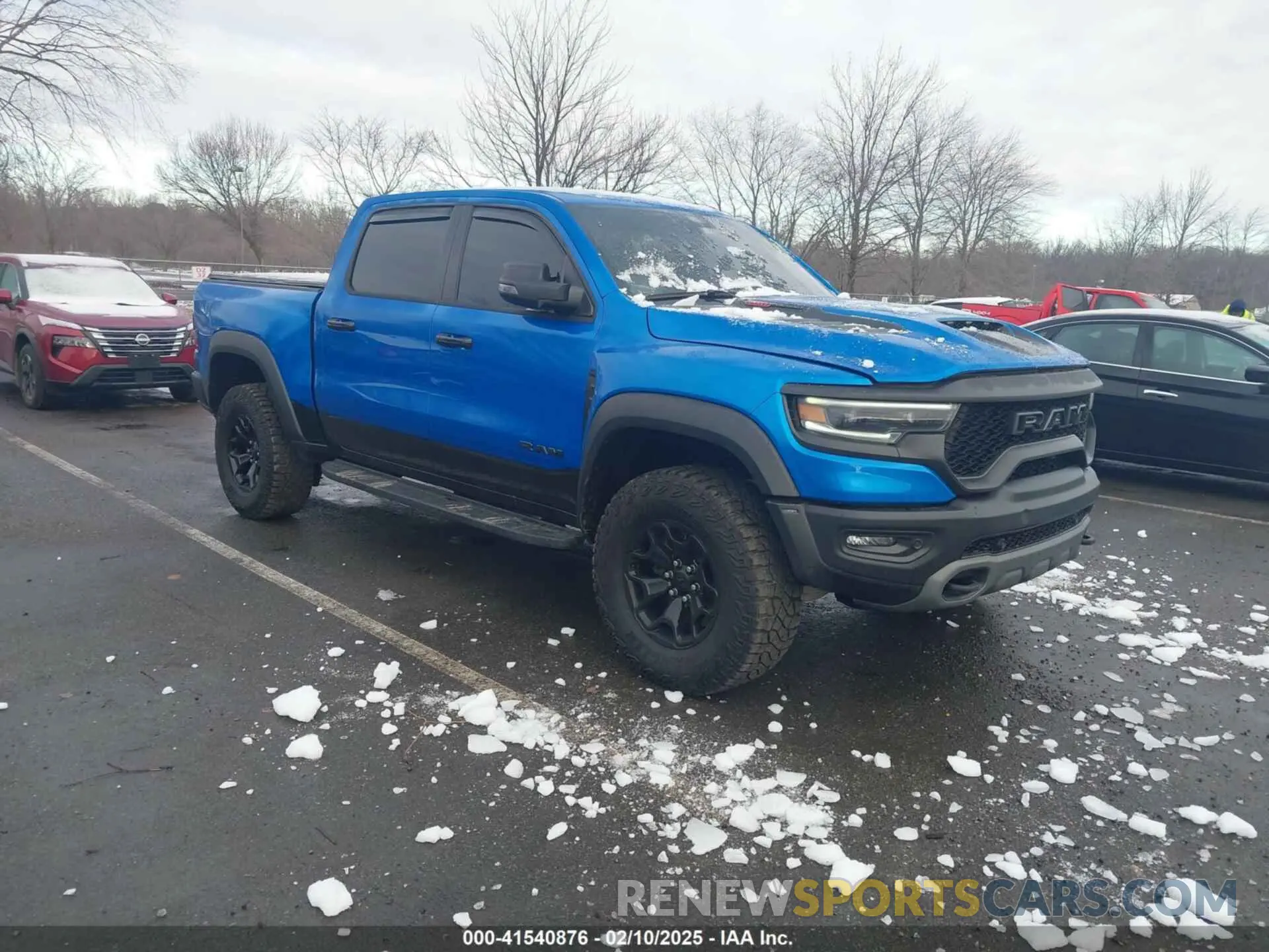 1 Photograph of a damaged car 1C6SRFU98PN529971 RAM 1500 2023