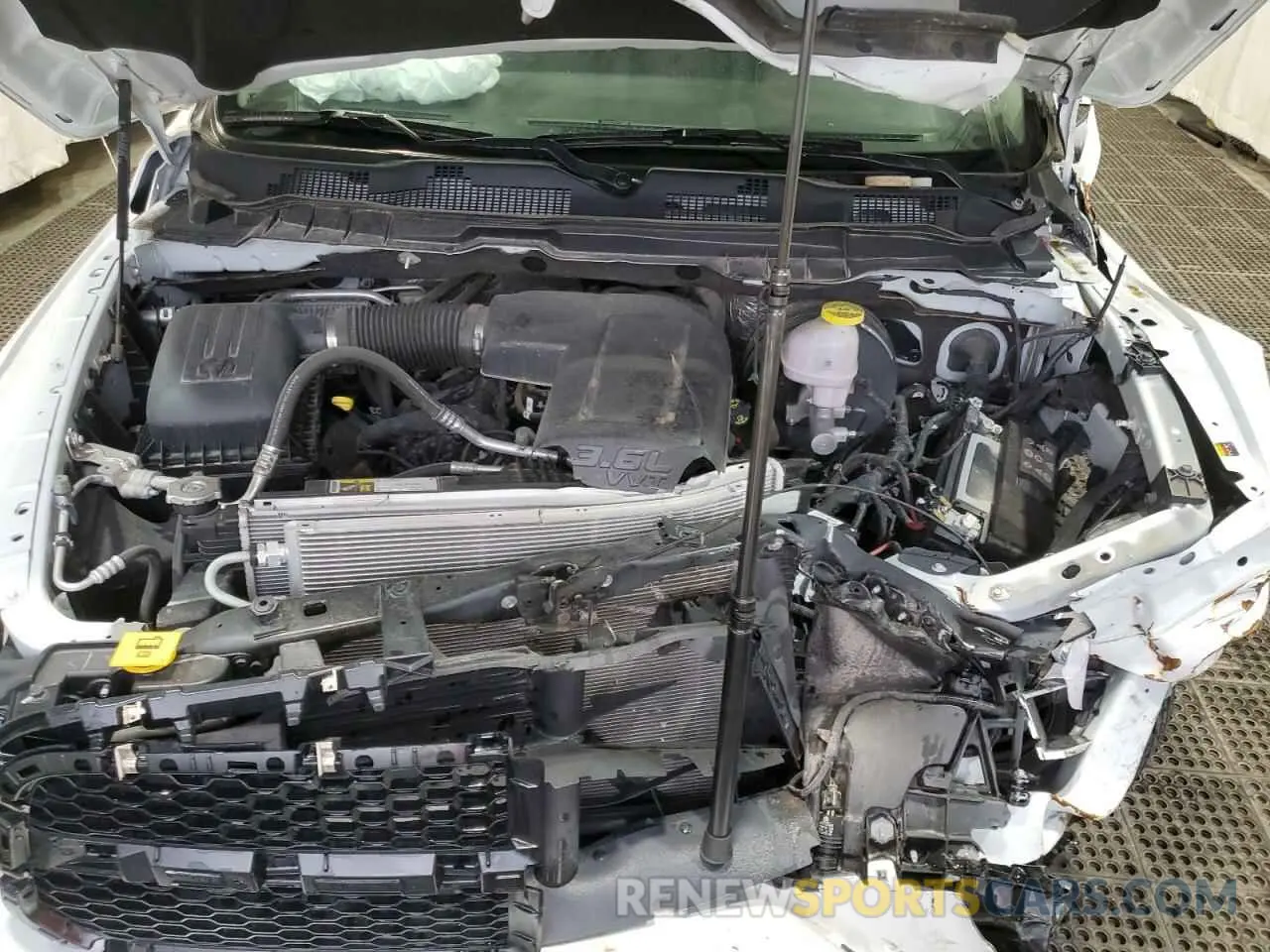 11 Photograph of a damaged car 3C6JR6DG0PG550543 RAM 1500 2023