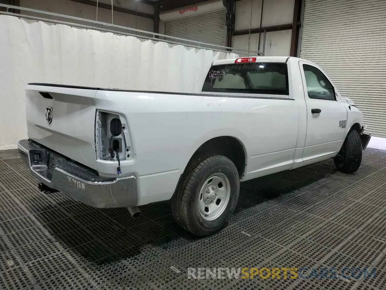 3 Photograph of a damaged car 3C6JR6DG0PG550543 RAM 1500 2023