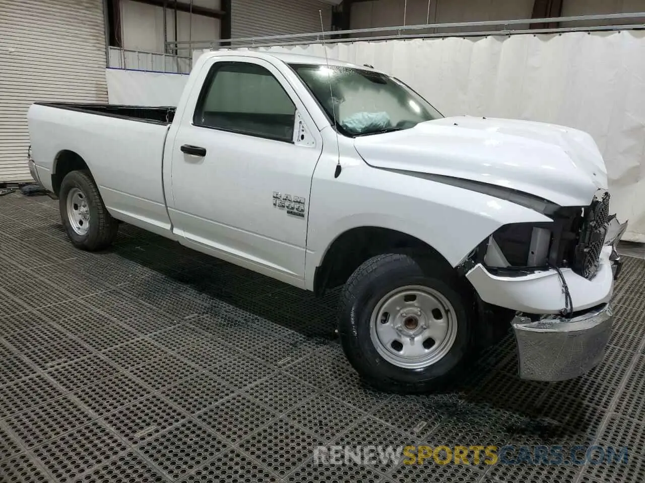 4 Photograph of a damaged car 3C6JR6DG0PG550543 RAM 1500 2023