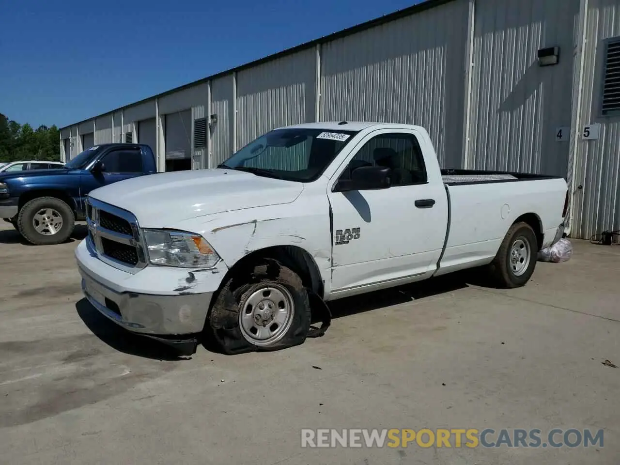 1 Photograph of a damaged car 3C6JR6DG0PG665031 RAM 1500 2023