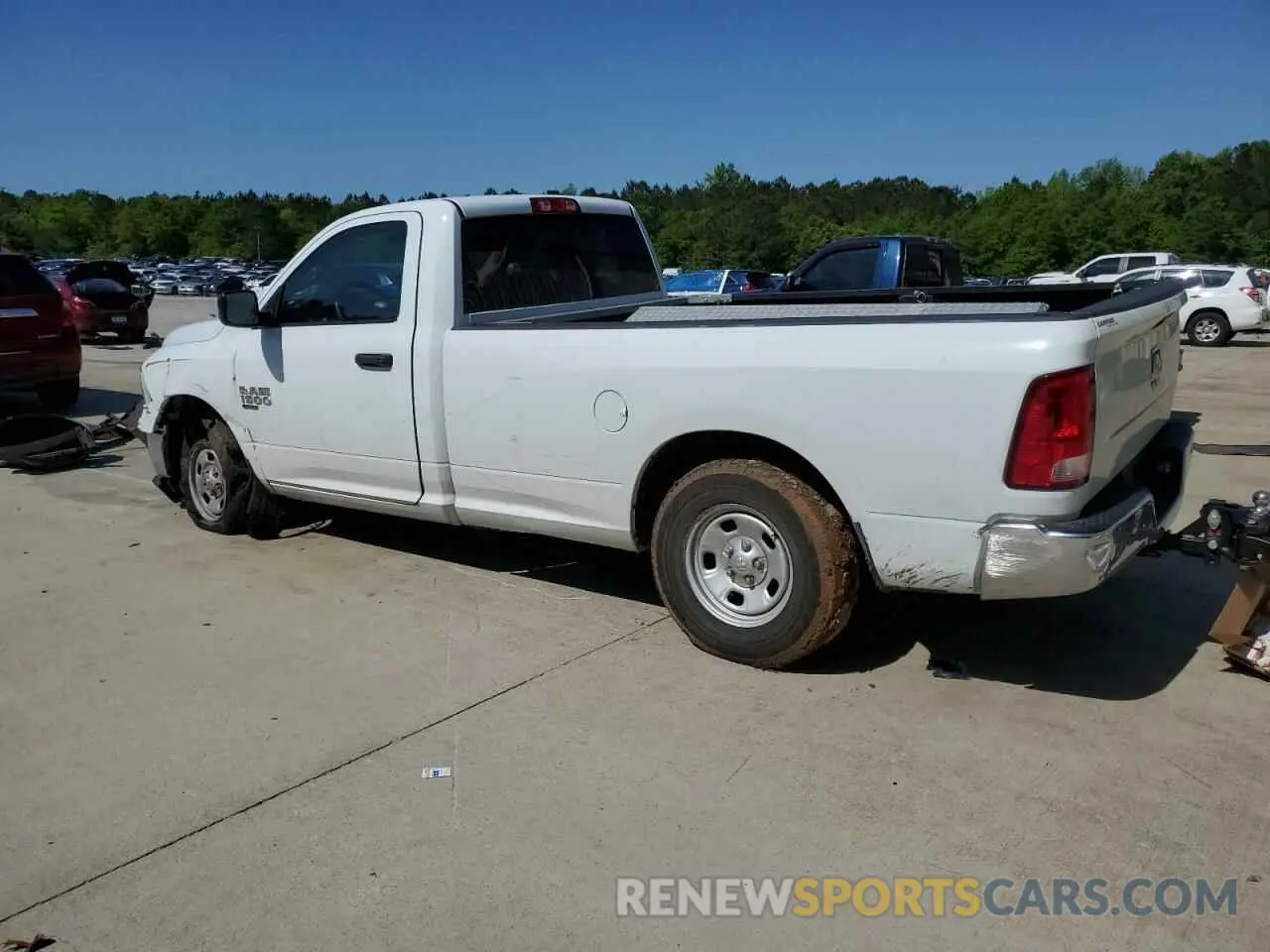 2 Photograph of a damaged car 3C6JR6DG0PG665031 RAM 1500 2023