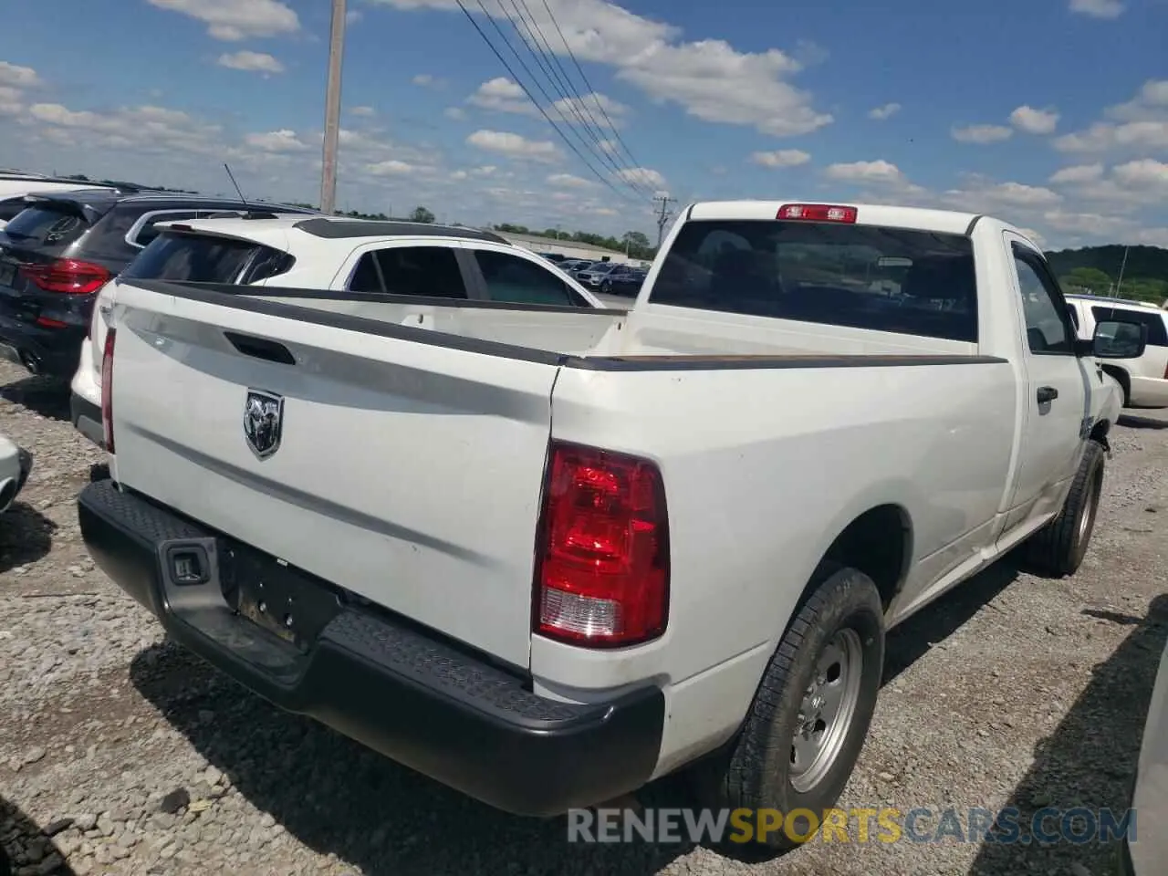3 Photograph of a damaged car 3C6JR6DG3PG550150 RAM 1500 2023