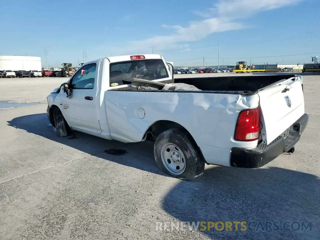 2 Photograph of a damaged car 3C6JR6DT0PG674339 RAM 1500 2023