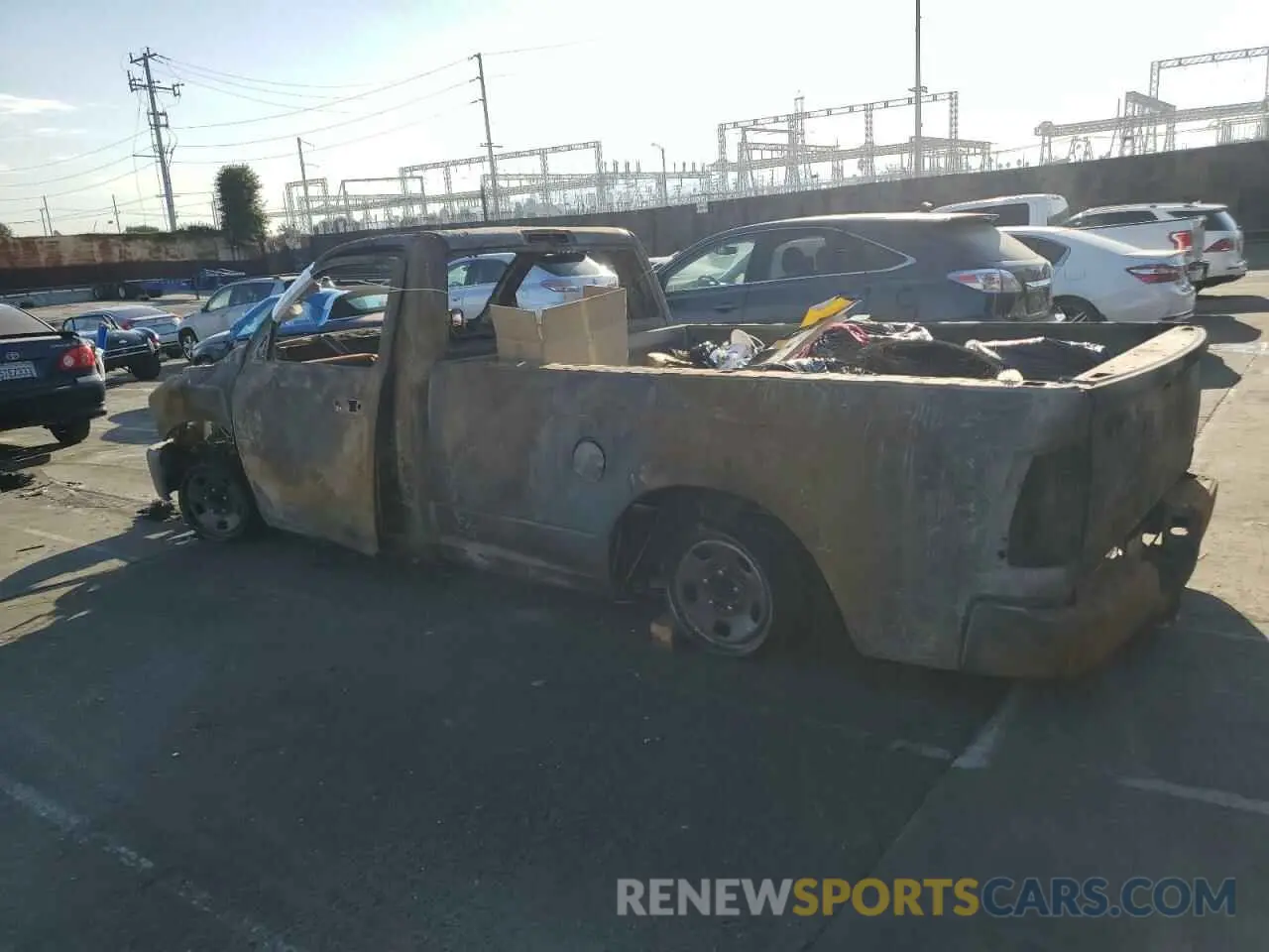 2 Photograph of a damaged car 3C6JR6DTXPG542964 RAM 1500 2023