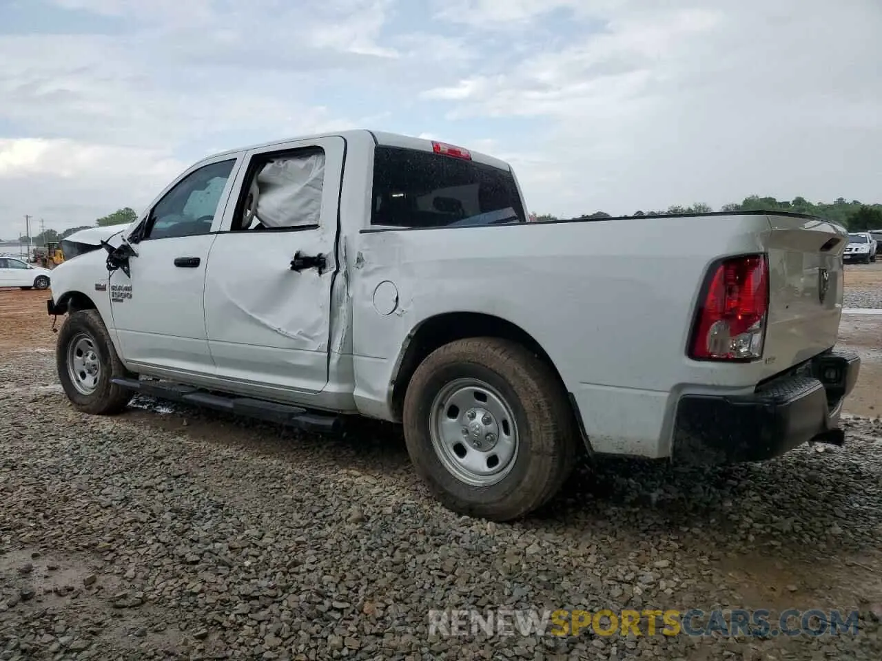2 Photograph of a damaged car 3C6RR6KT5PG571522 RAM 1500 2023