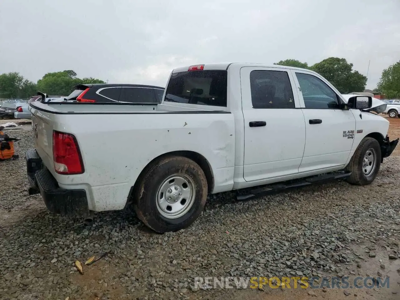 3 Photograph of a damaged car 3C6RR6KT5PG571522 RAM 1500 2023