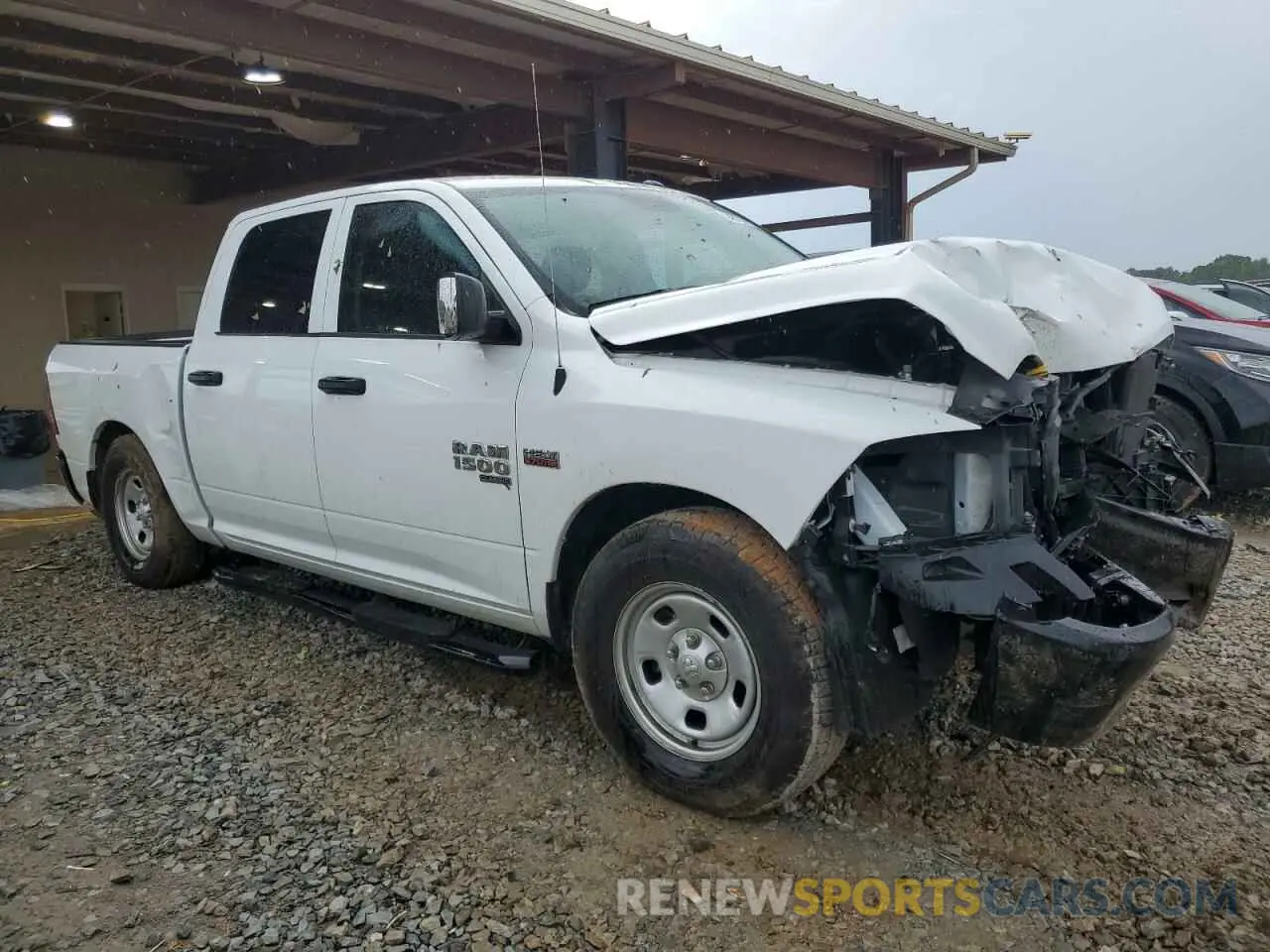 4 Photograph of a damaged car 3C6RR6KT5PG571522 RAM 1500 2023